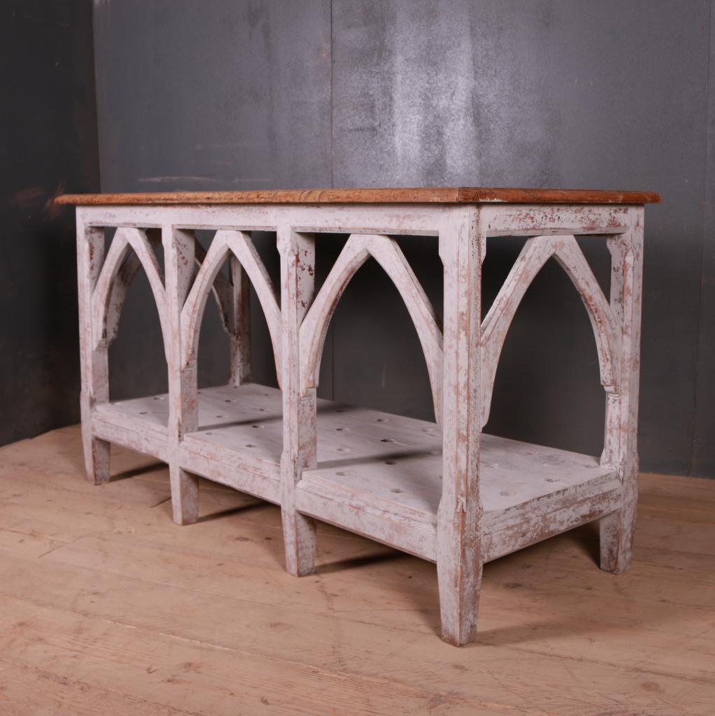 19th c unusual painted pine Gothic console table/ Island unit, 1860.

Dimensions:
63.5 inches (161 cms) wide
25.5 inches (65 cms) deep
33.5 inches (85 cms) high.