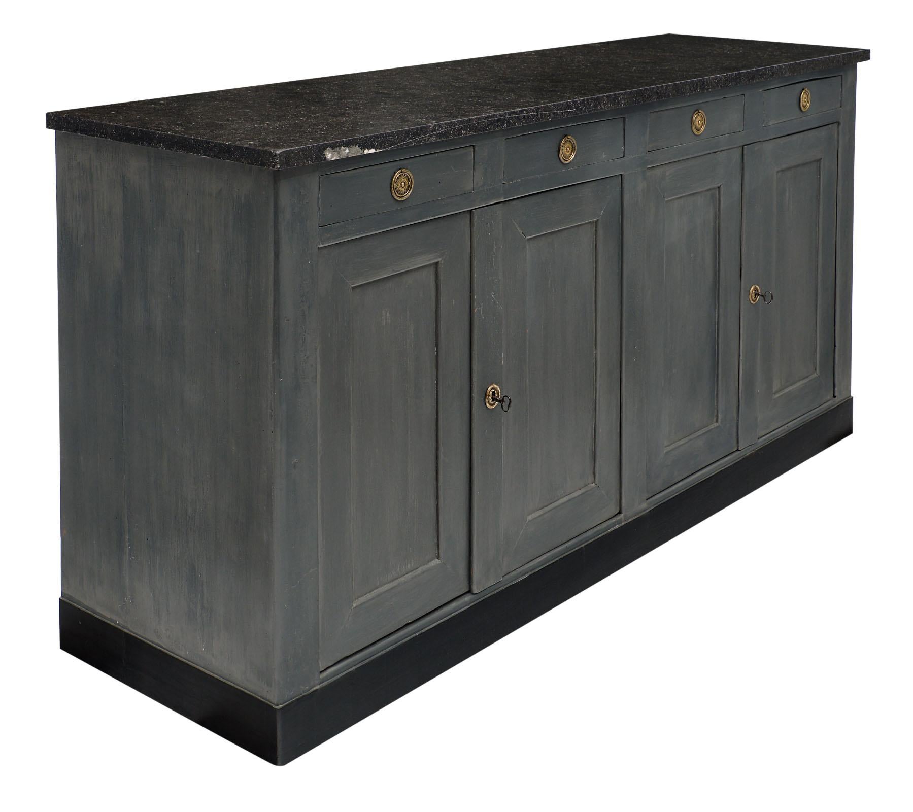 French provincial painted gray buffet made of solid fir and oak. We love the hand painted finish to this credenza with the deep gray color. It features a beautiful and original slab of gray marble as well. There are four dovetailed drawers above