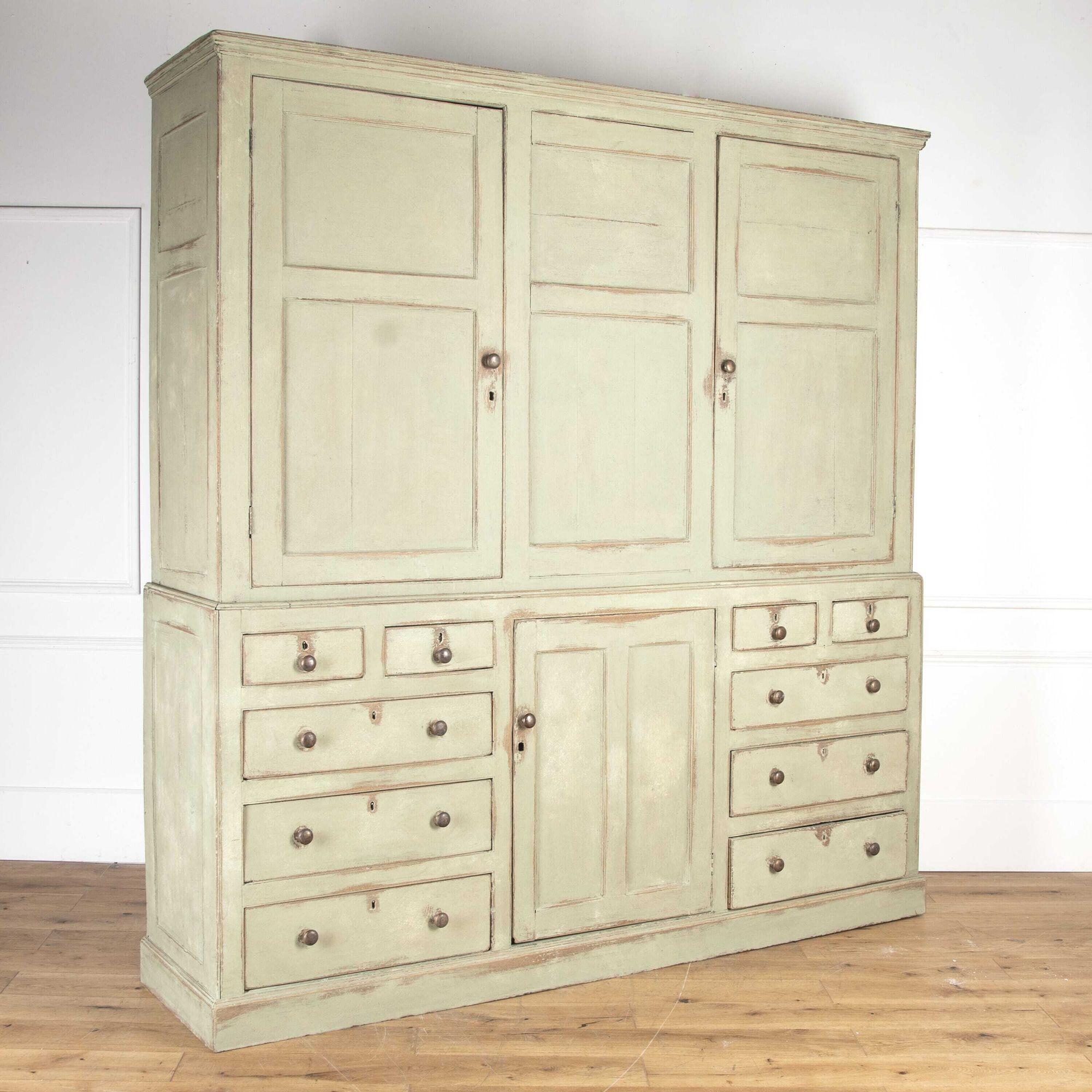 Fabulous 18th Century painted oak housekeepers cupboard.
This cupboard provides excellent storage because of how it splits into two halves. It is also a well-proportioned cupboard, it features three cupboard doors to the top which open to reveal