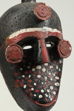 Painted Ibibio Polychrome Face Mask with Figure on Top, Nigeria Africa colorful