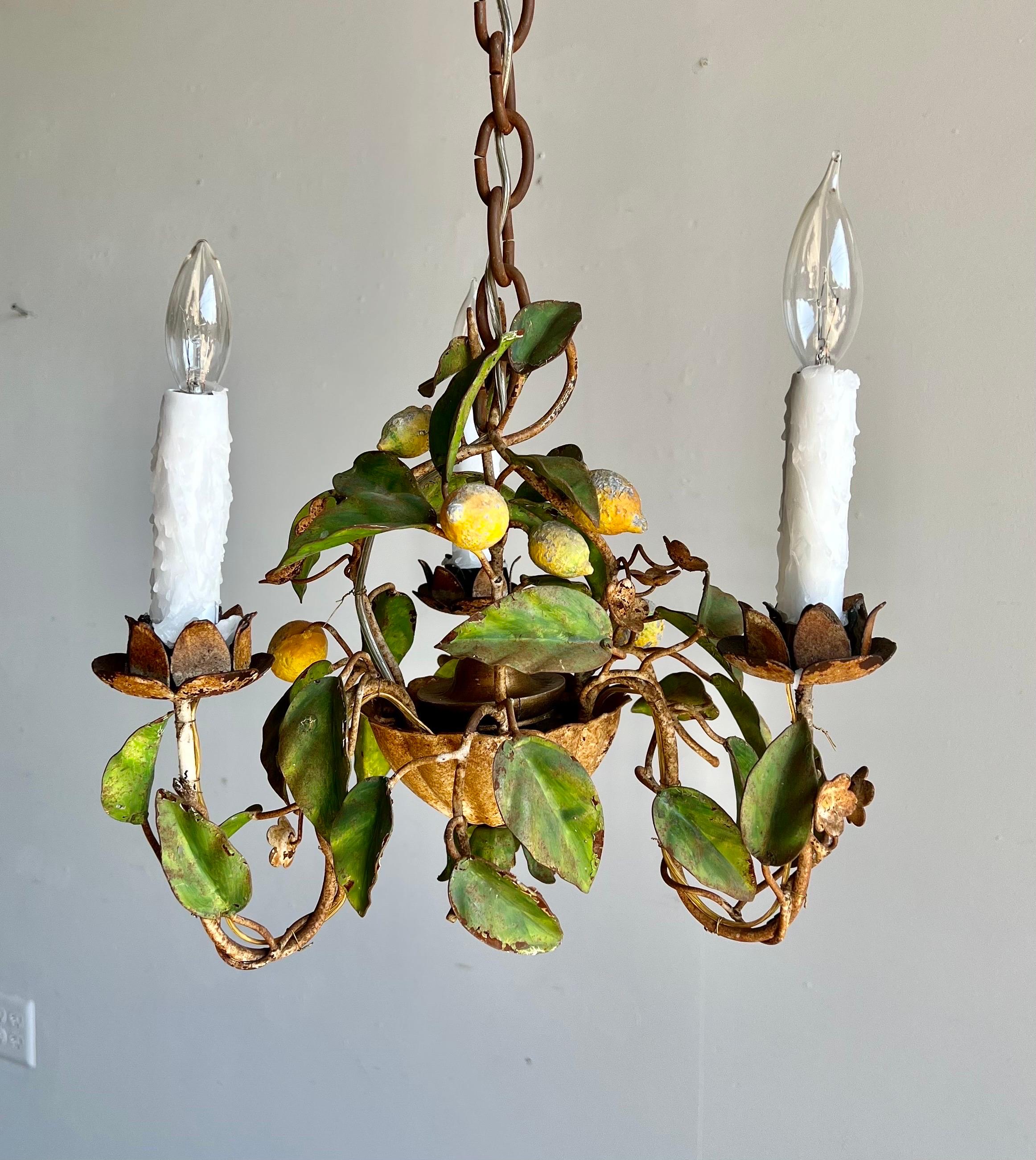 3-light green & yellow painted metal chandelier depicting a lemon tree. The chandelier is newly rewired and includes chain and canopy.
