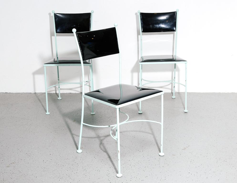 Curvy iron frames with ball accents, painted in a very light blue enamel. Black patent leather vinyl seats and backrest. Somewhat reminiscent of Jean Royère ironwork designs. Sold as a set of 3.

17.75
