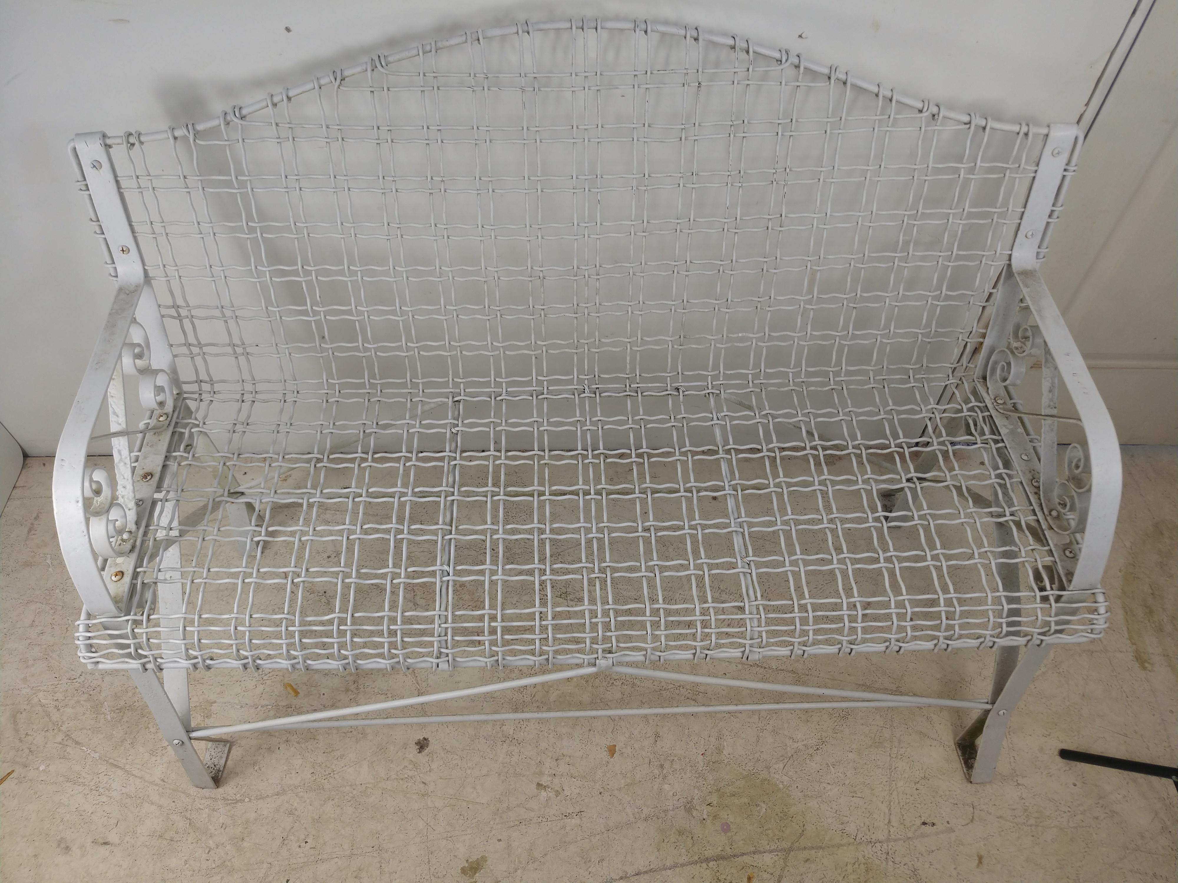 Wrapped wire and steel 2 seat garden bench. Very comfortable with arched back. Stable, not flimsy or awkward. Seat hgt. is 17.5. In excellent vintage condition with minimal wear.