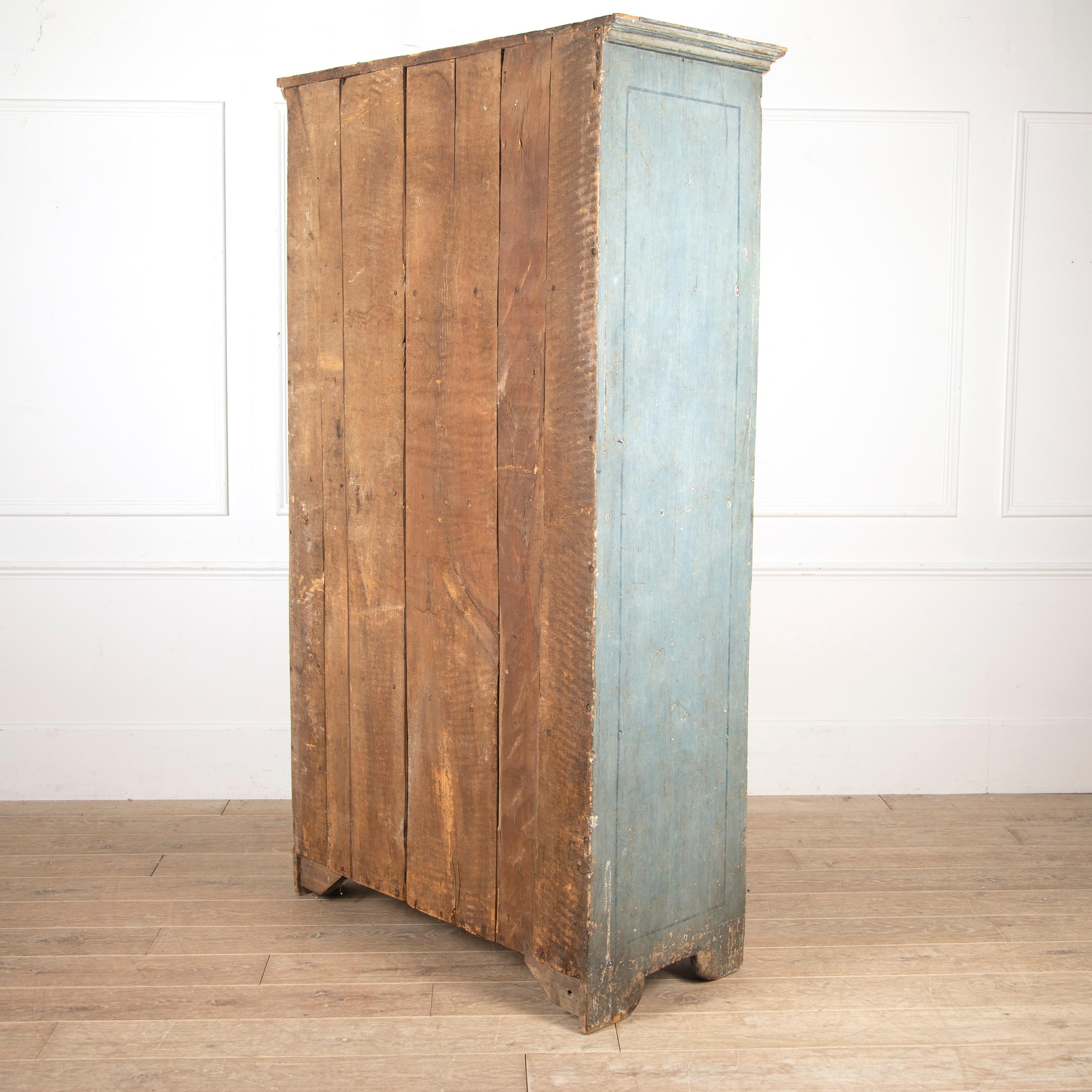 Painted 18th century Italian cupboard.

The cupboard retains its original paintwork, has a moulded cornice above a pair of doors. Features a painted classical scene, and is supported on quadrant feet.

A superb cupboard that is both stylish and