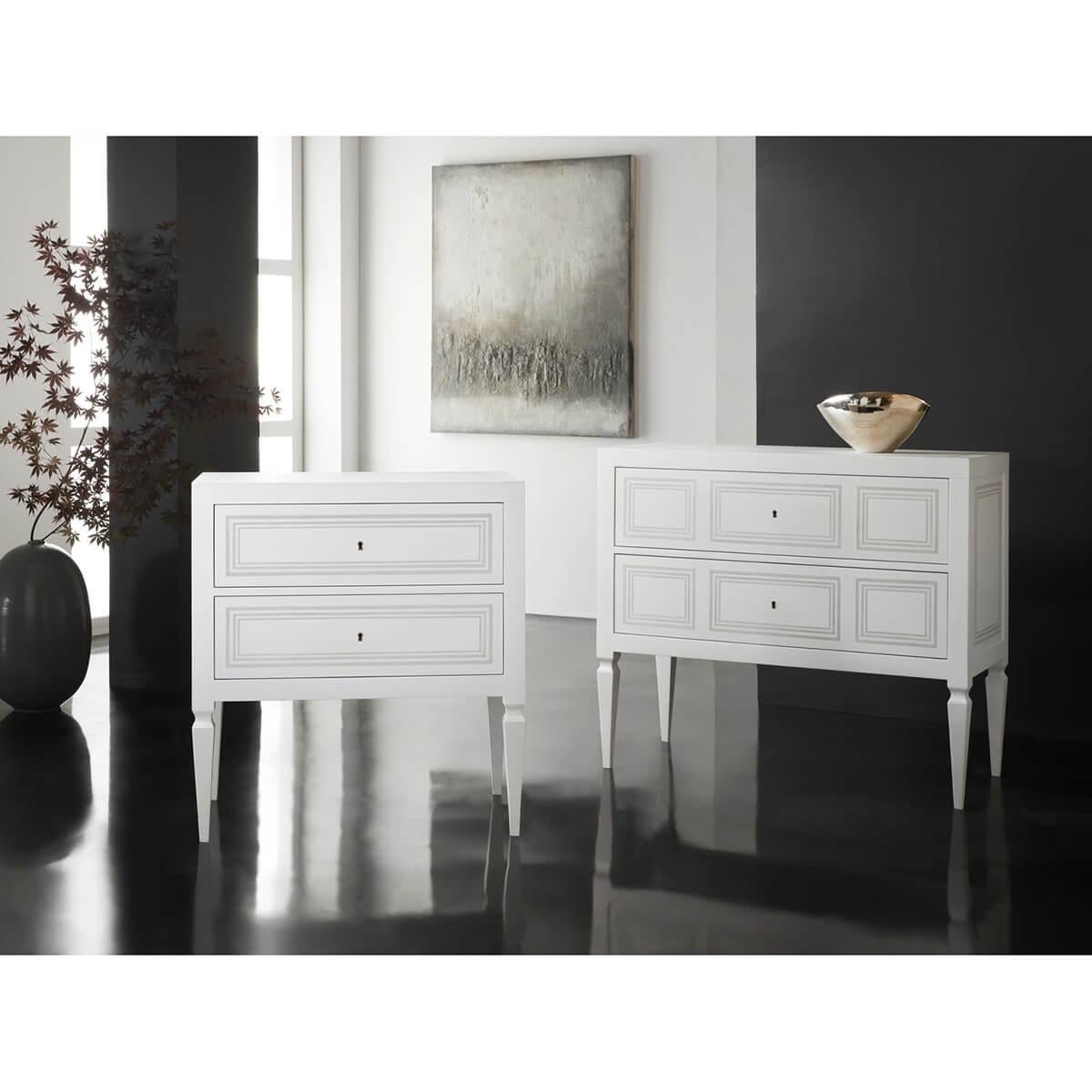 Linen color painted and textured, this bedside chest boasts beautiful gray painted geometric designs on the drawers and side panels that add a touch of timeless elegance.

With working locks on the two drawers and raised on square tapered legs, this