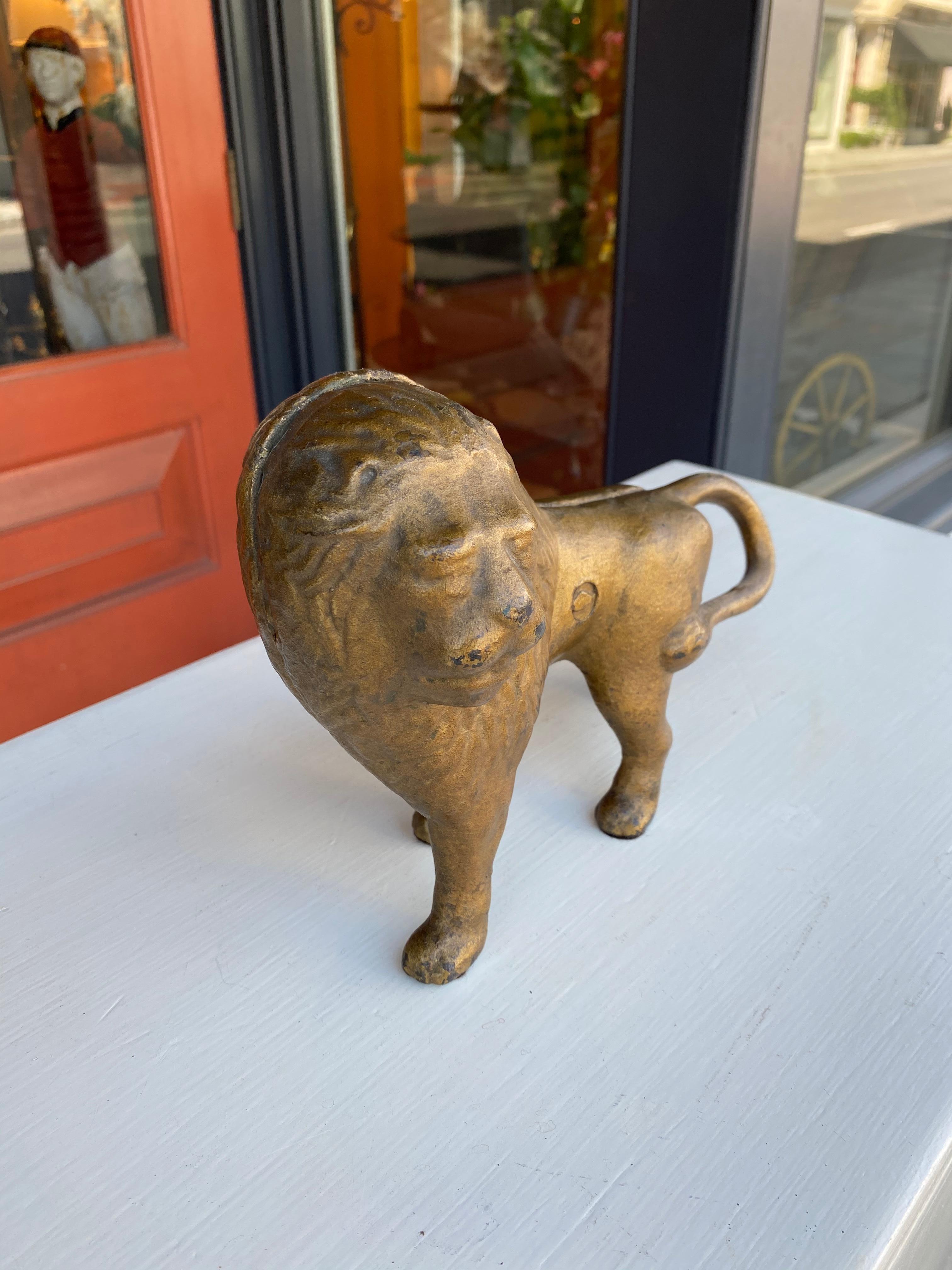 North American Painted lion doorstop For Sale