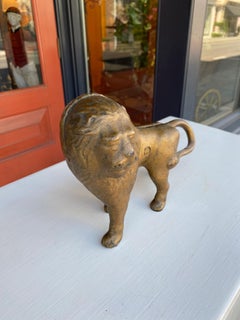 Painted lion doorstop