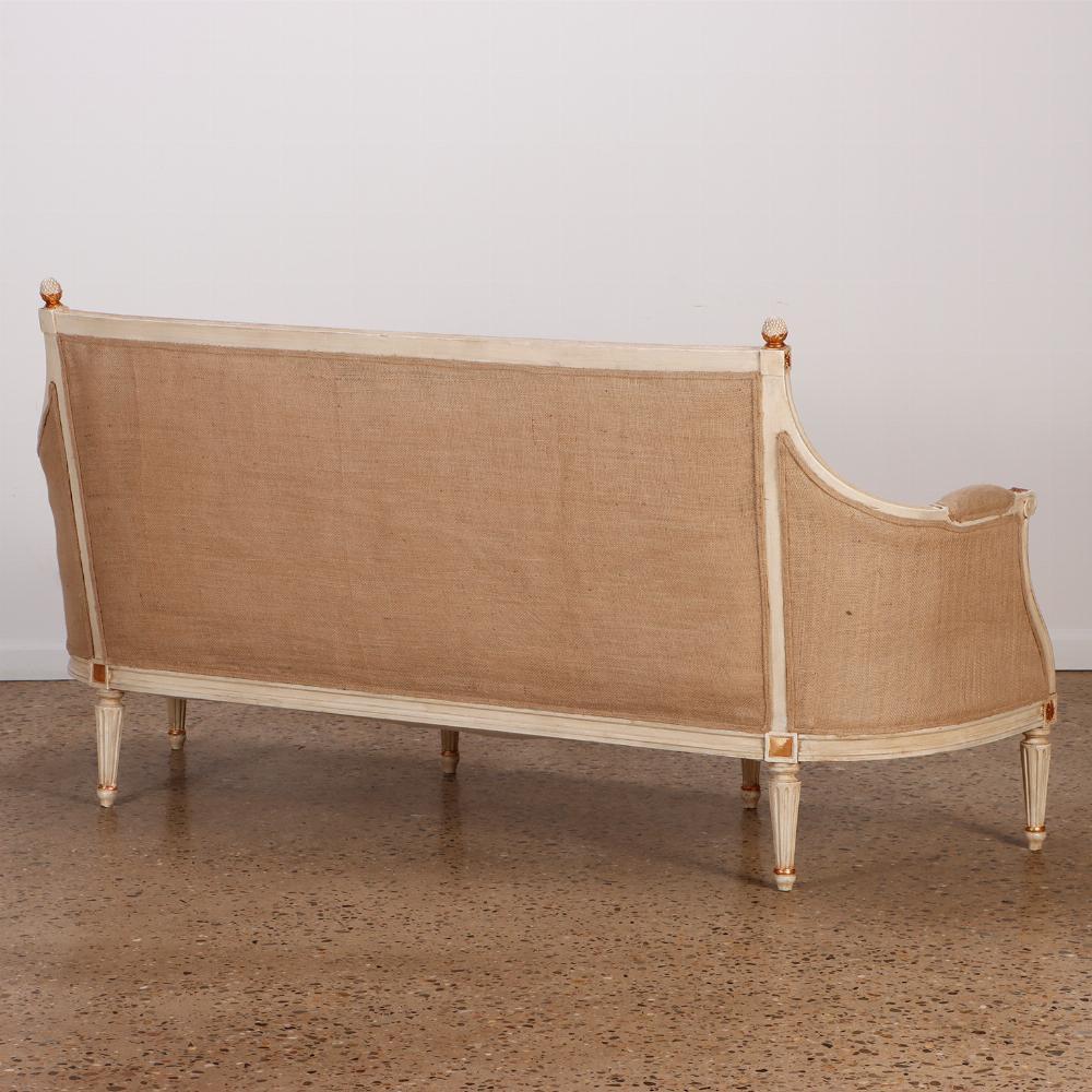 French Painted Louis XVI style six leg sofa circa 1940 with gilt hightlights For Sale