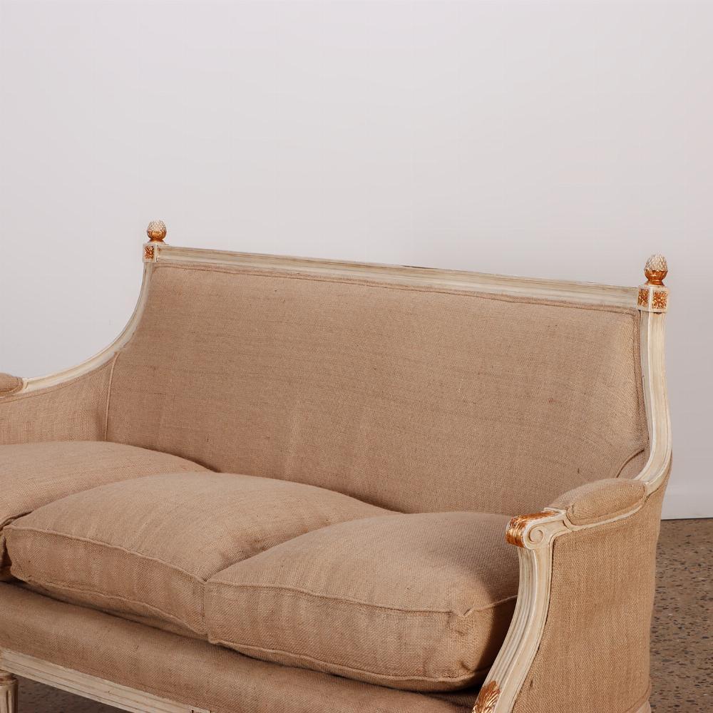 Mid-20th Century Painted Louis XVI style six leg sofa circa 1940 with gilt hightlights For Sale