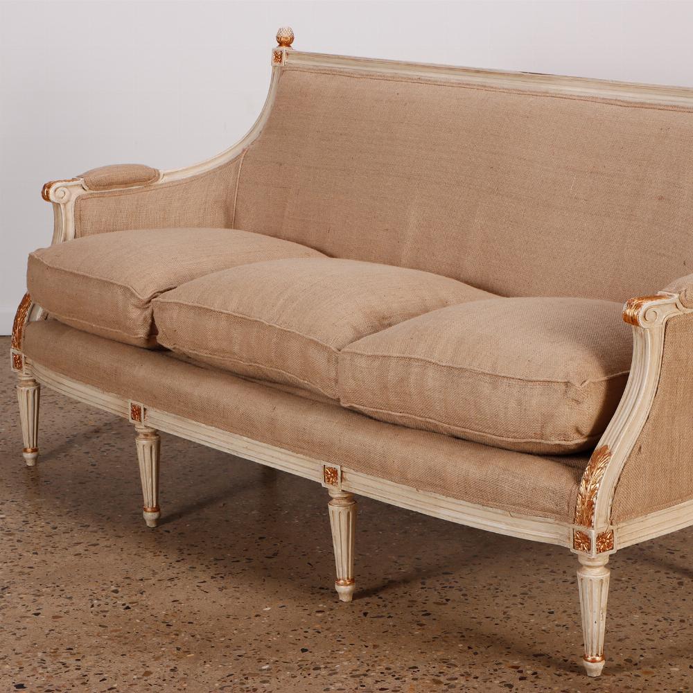 Upholstery Painted Louis XVI style six leg sofa circa 1940 with gilt hightlights For Sale