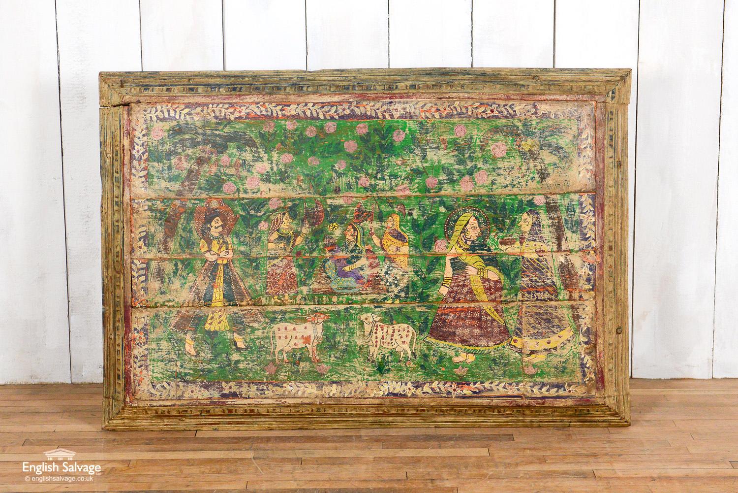 Charming Folk Art style painted teak panel. The painting of a pastoral Indian scene is naïve in style and has a weathered finish commensurate with its age. The distressed paint gives a beautiful patina well suited to the rustic construction of the