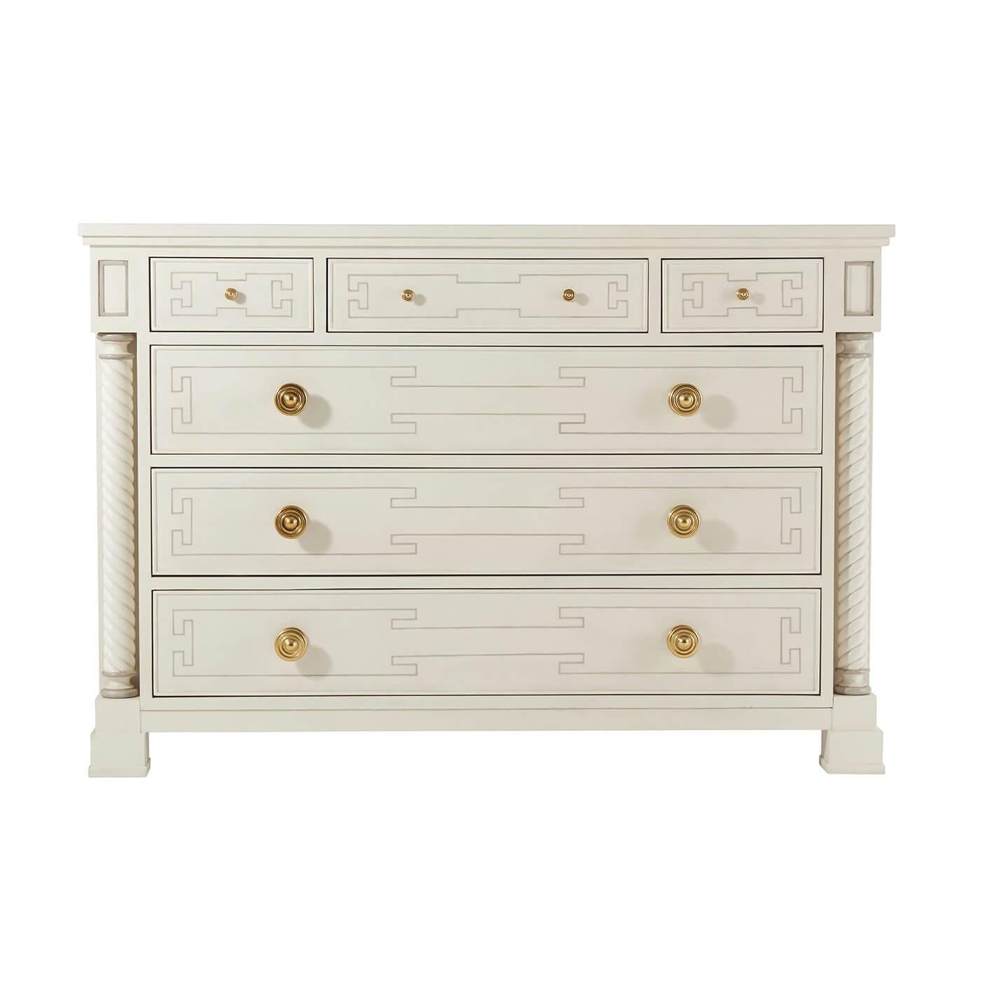 A NeoClassic inspired six-drawer chest of drawers. With three frieze drawers atop three more long graduated drawers, with bold brass handles. Flanked by spiral turned columns and set on block feet.

Dimensions: 49.5