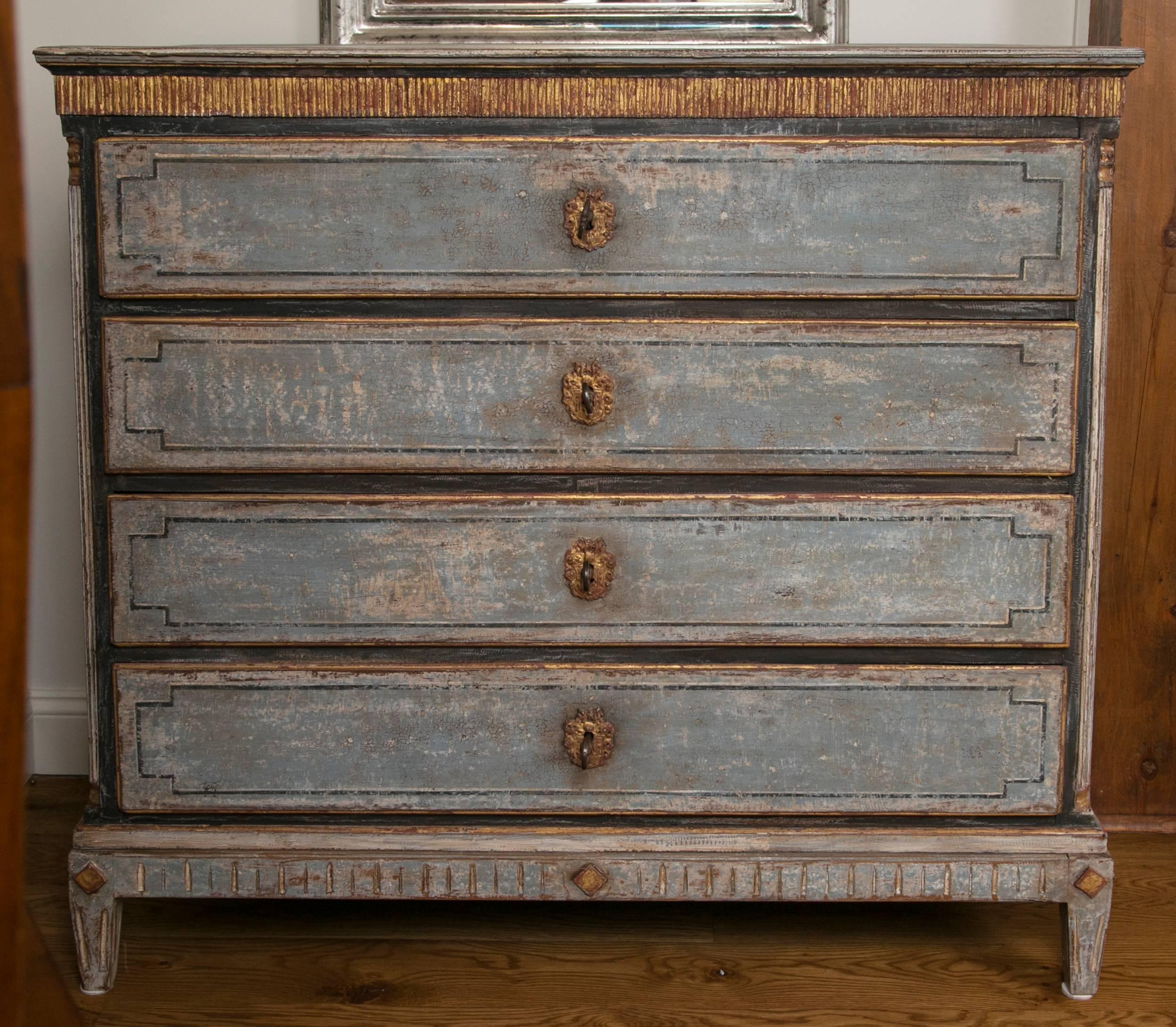 Wonderful large painted 18th century chest comprised of four drawers, painted in greige-blue tones with gilded accents, carcass orginal, paint refurbished, shown with original working keys to each drawer