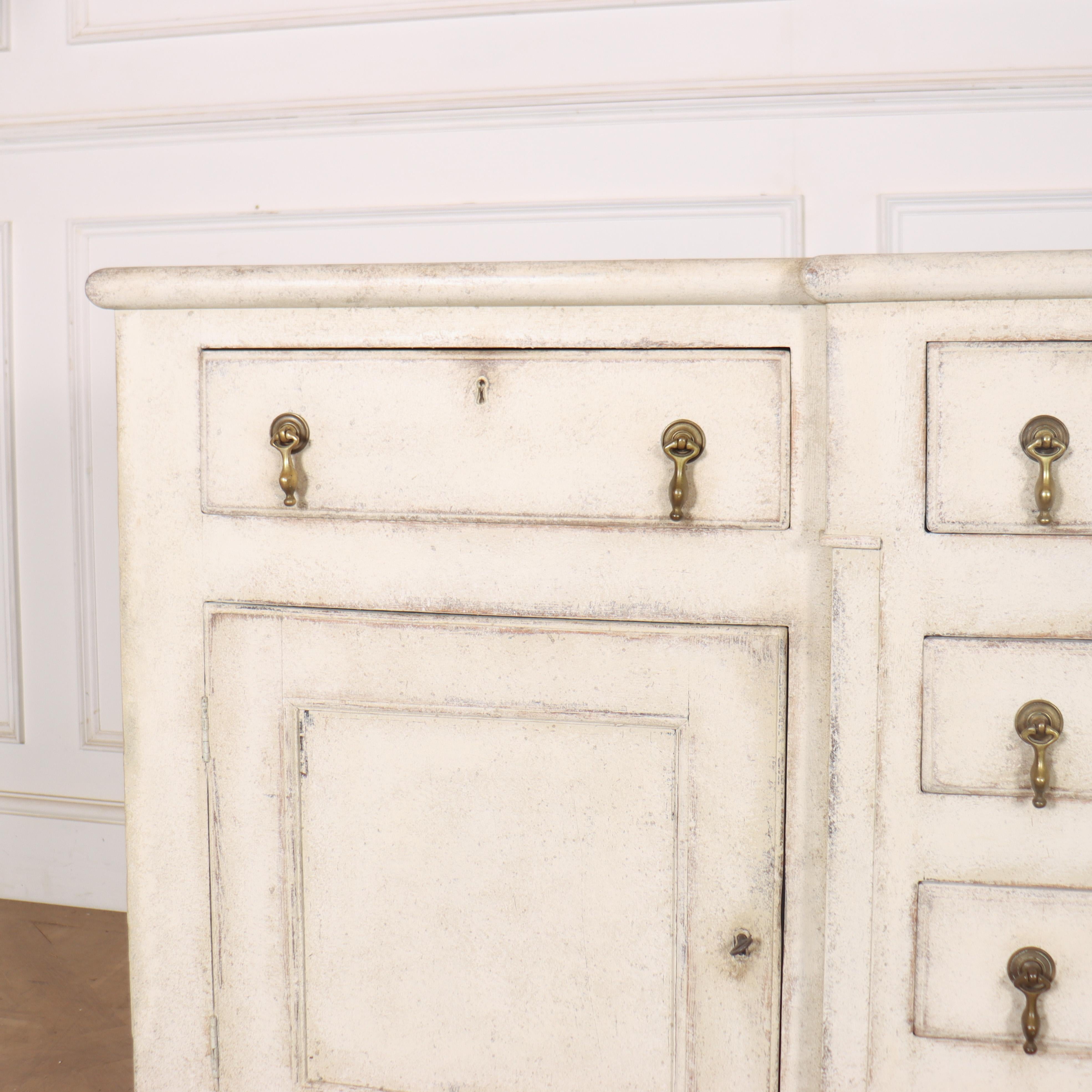 Good early 19th century painted pine North Welsh dresser base. 1820.


Code: 8838

Dimensions:
W: 65.5