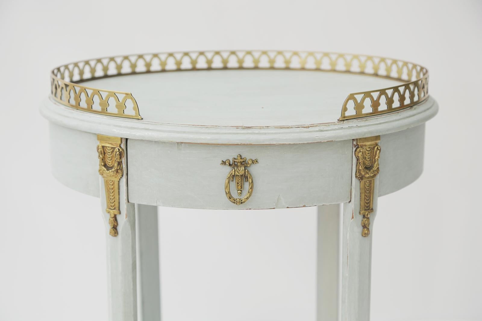 Gilt Painted Oval Occasional Table with Bronze Gallery For Sale