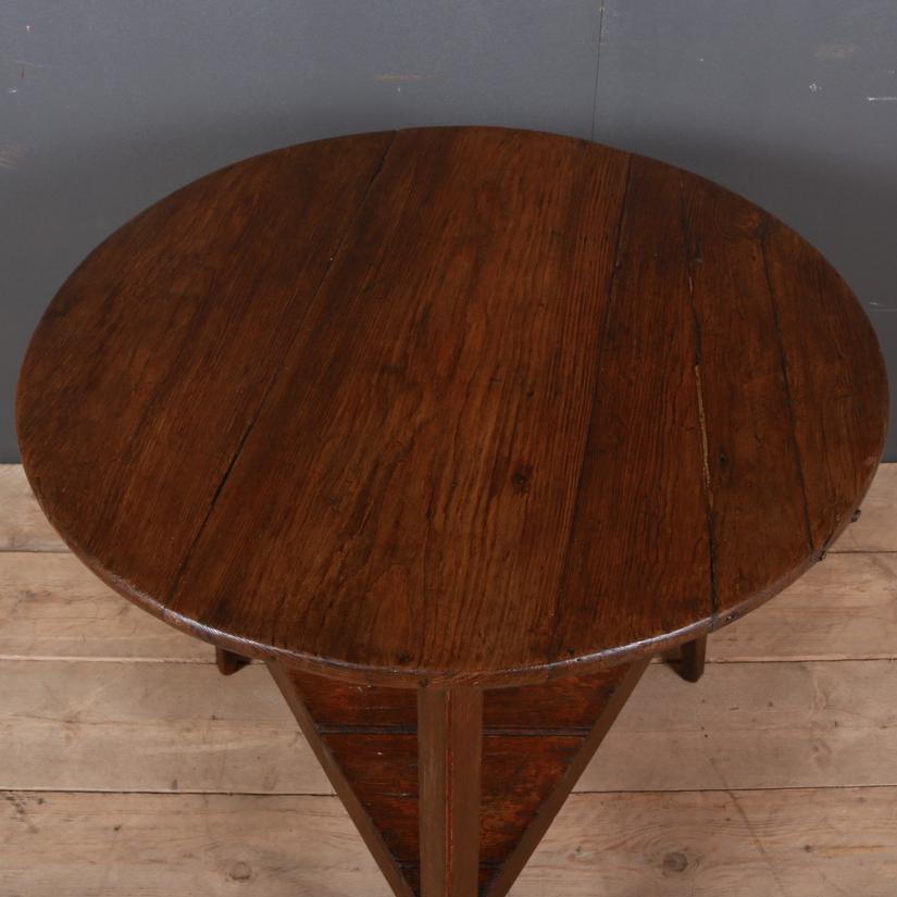 Early 19th century painted pine cricket table, 1820.

Dimensions:
30 inches (76 cms) high
32 inches (81 cms) diameter.

 