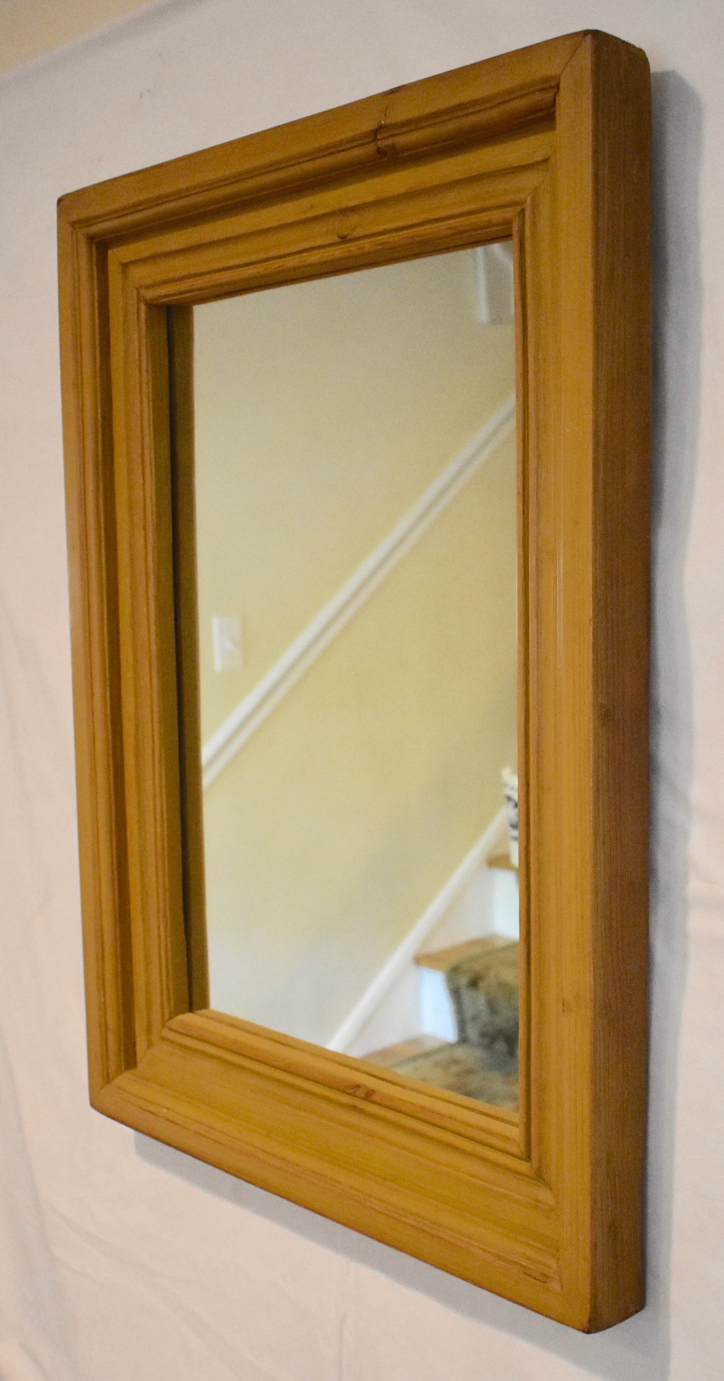 This handsome and versatile pine wall mirror has a bold, nicely-contoured frame, 3.5