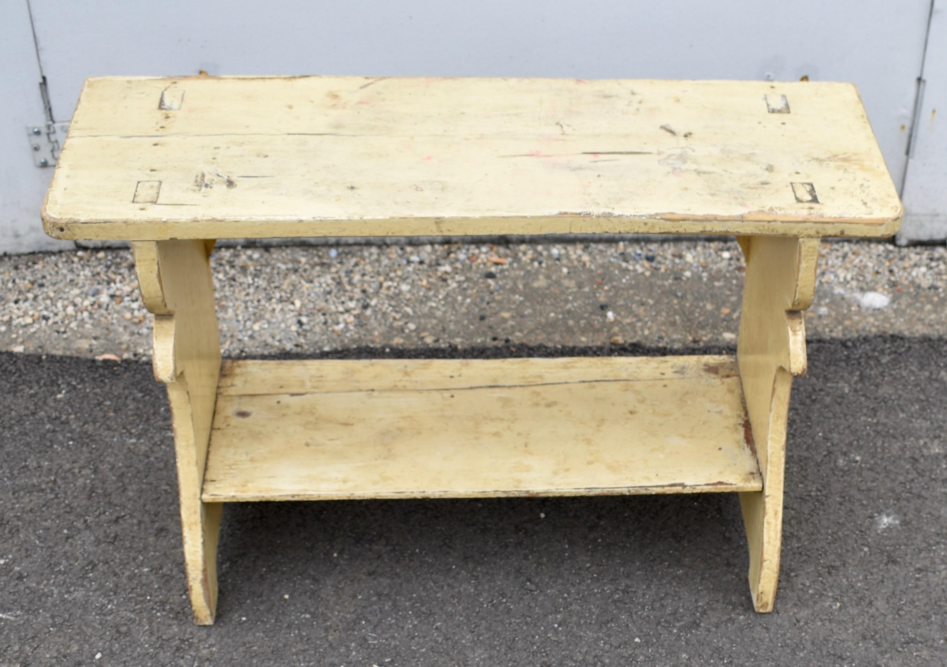 What a pretty little Water Bench, also known as a Bucket Bench, used for storing vessels of all kinds. To help take the weight the shapely sides are fully mortised all the way through the top and the lower shelf is dovetailed into the sides from the