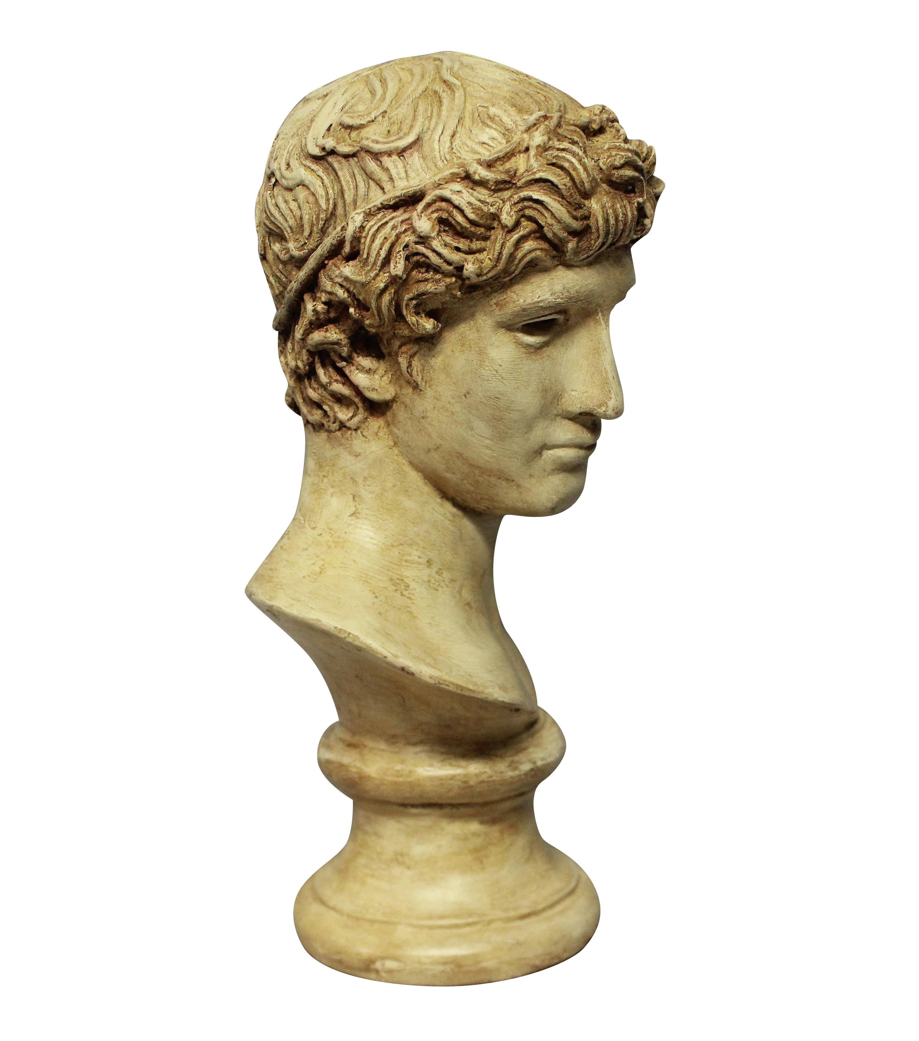 An English painted plaster head of a Roman youth.
