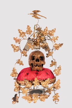 Painted plaster sculpture depicting a skull. Italy late 19th century.