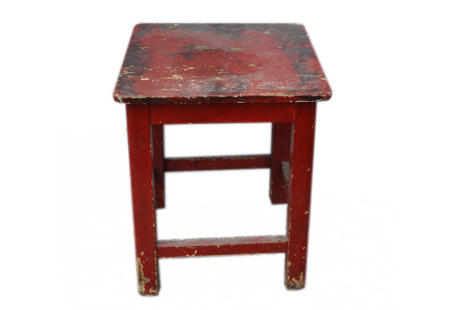 Red stool, 1920s.
This is a rectangular stool that once were used in a country house.
This is in a tarnished condition with wonderful patina and worn with tons of charm.