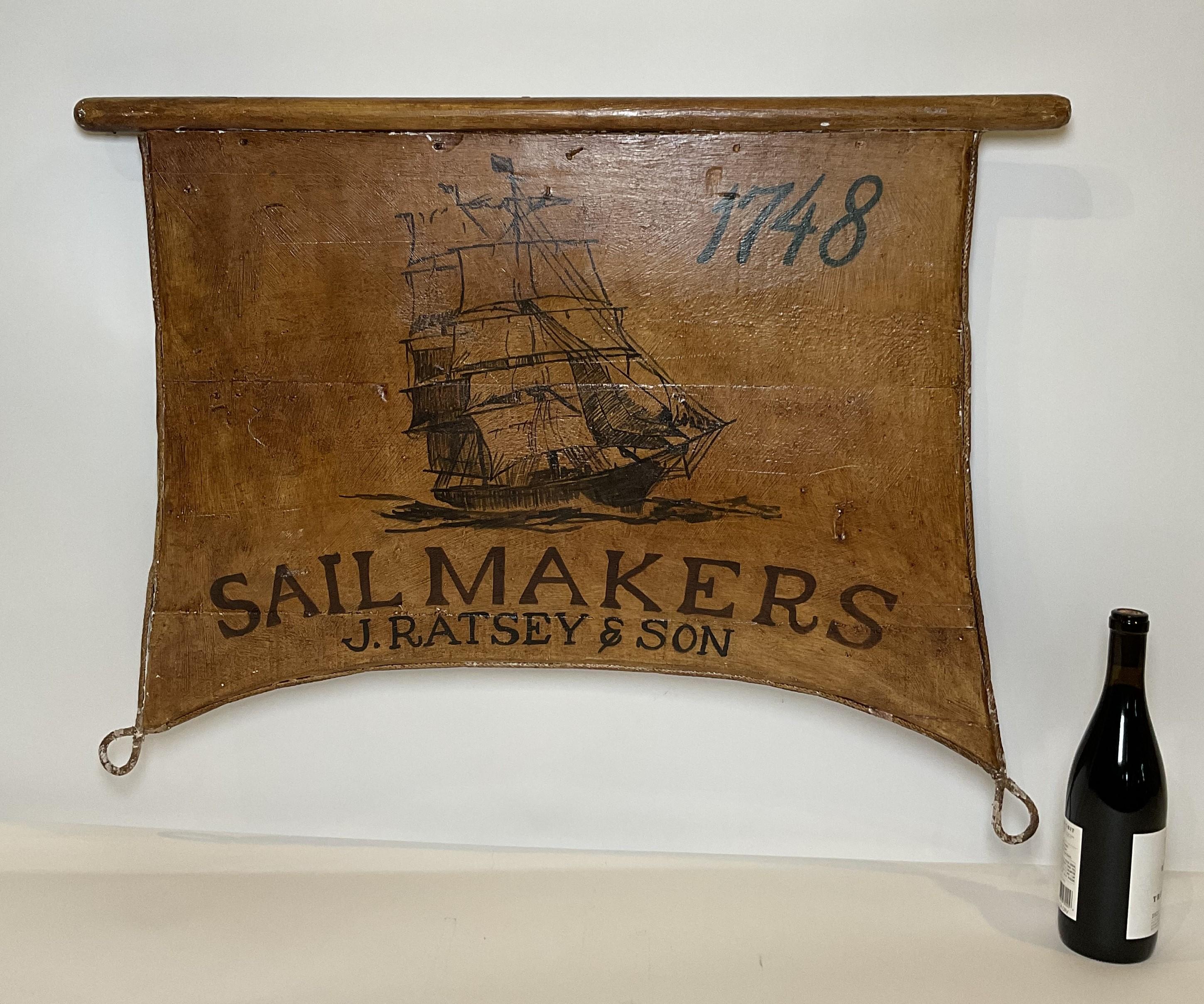 J. Ratsey & Son letrero comercial pintado con un barco clíper pintado sobre un panel de madera atado con cuerda con un larguero de madera de unos cincuenta años de antigüedad.

Peso:    6 lbs.
Dimensiones generales:    25