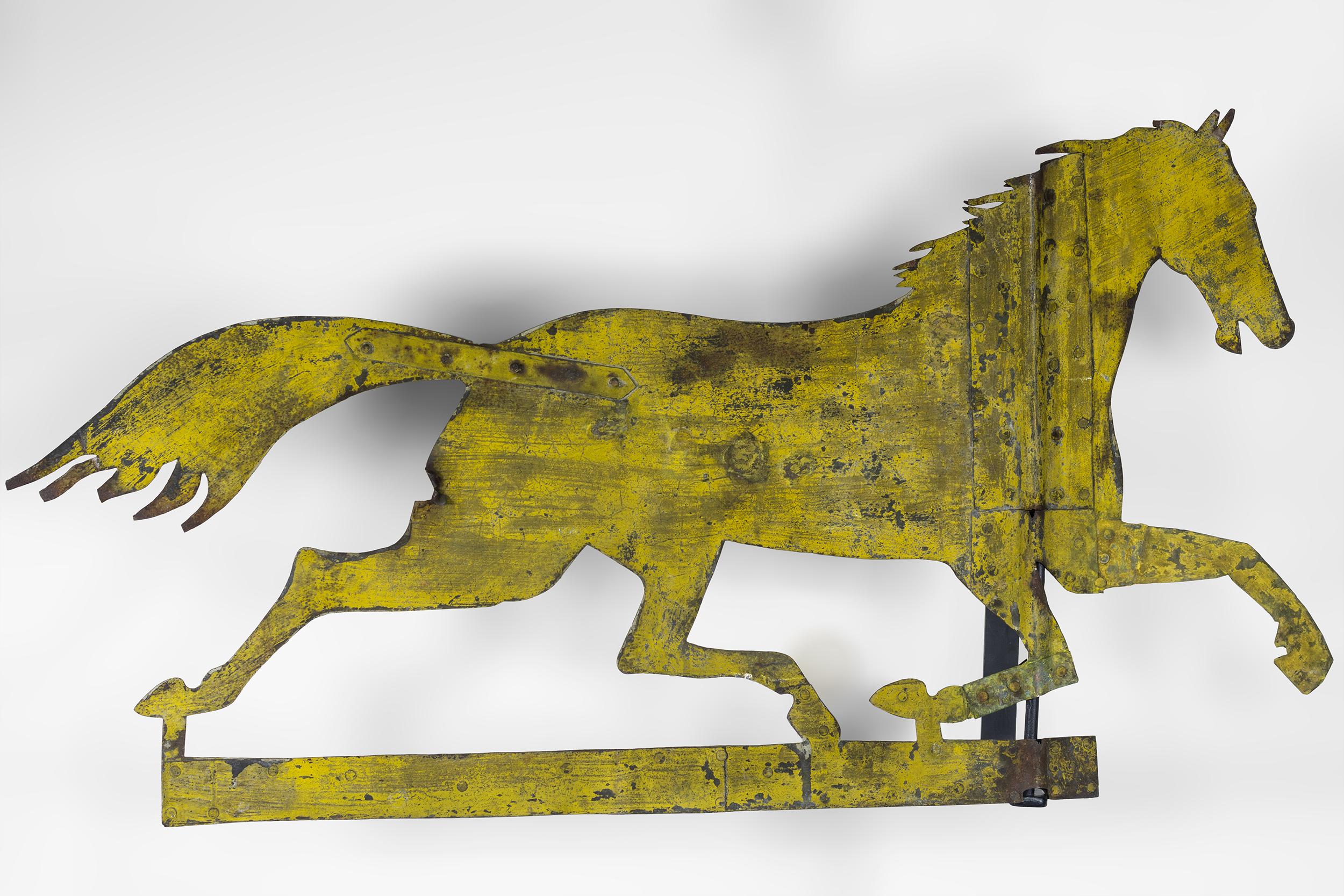 Sheet iron Silhouette running horse weathervane with mustard paint.
Great surface with the original paint
Mounted on a contemporary wall bracket.
 
