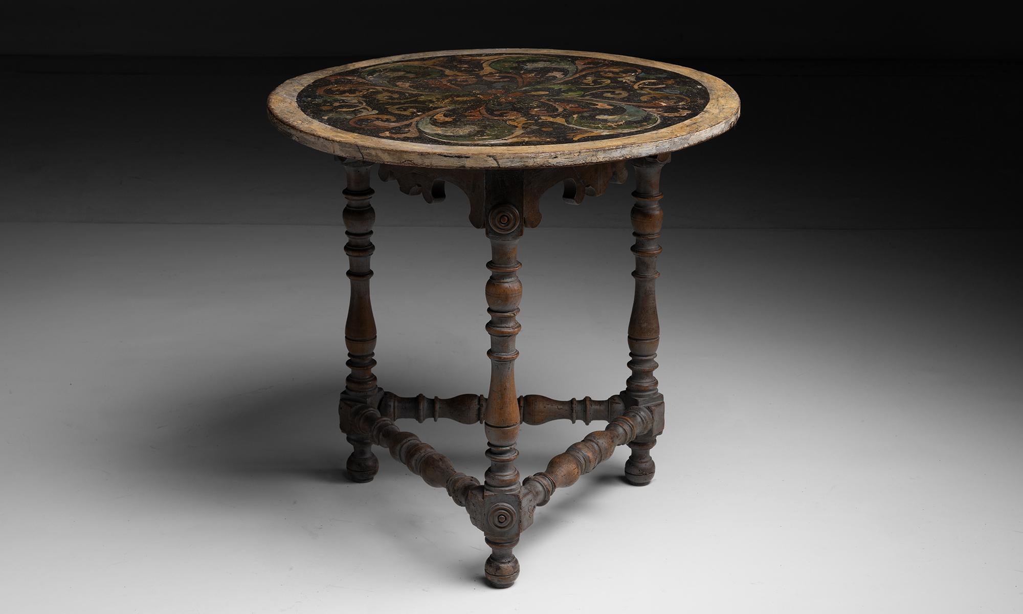 Painted Side Table

France circa 1890

Hand painted circular top, with three turned legs and stretcher.

31”dia x 29.75”h