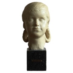 Painted terracotta bust of a girl