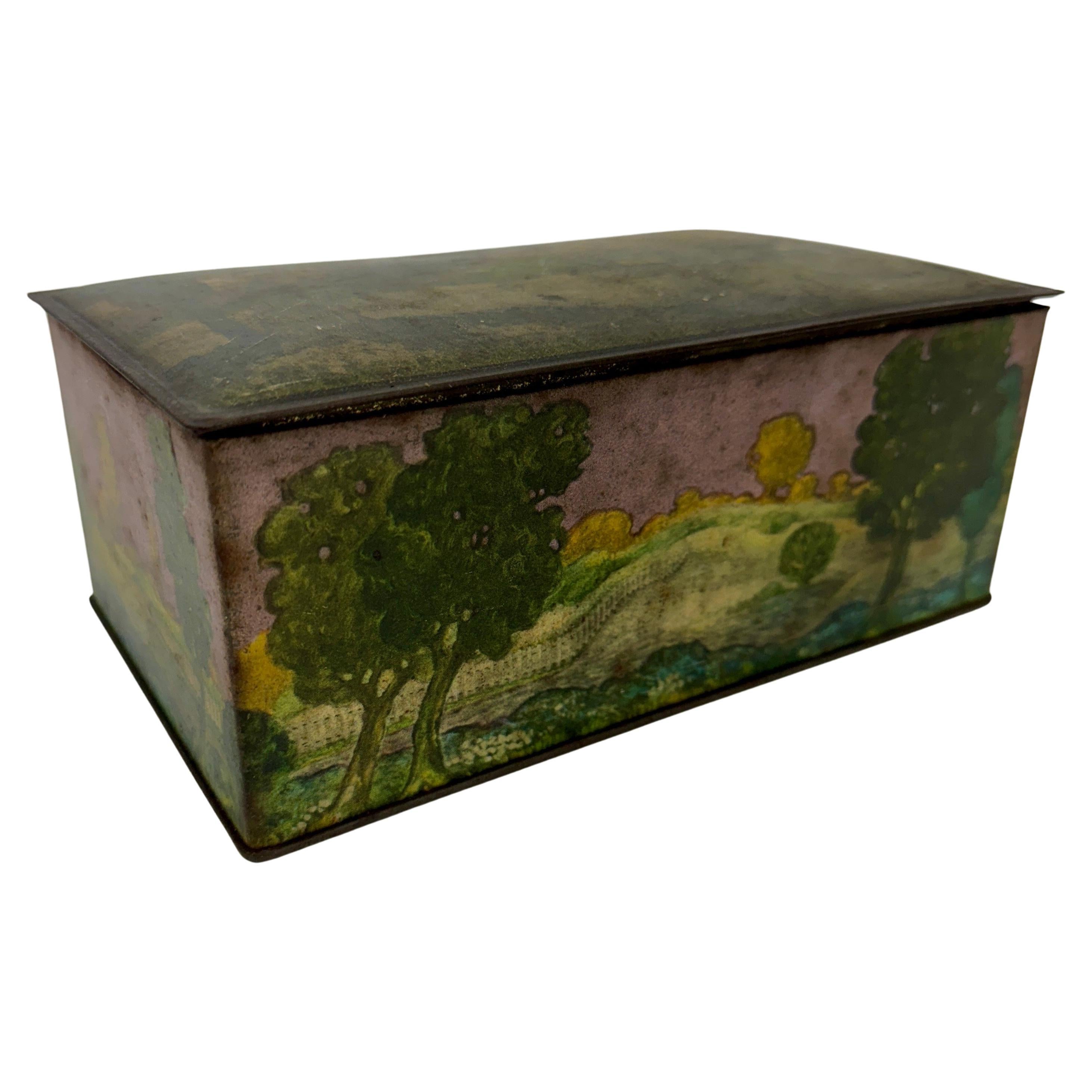 Canco Painted Tin Box with Landscape, circa....

Very charming vintage tin box depicting a serene landscape with trees, a building and a fence. Wonderful versatile piece to be used functionally or for display in any formal or informal setting. Great