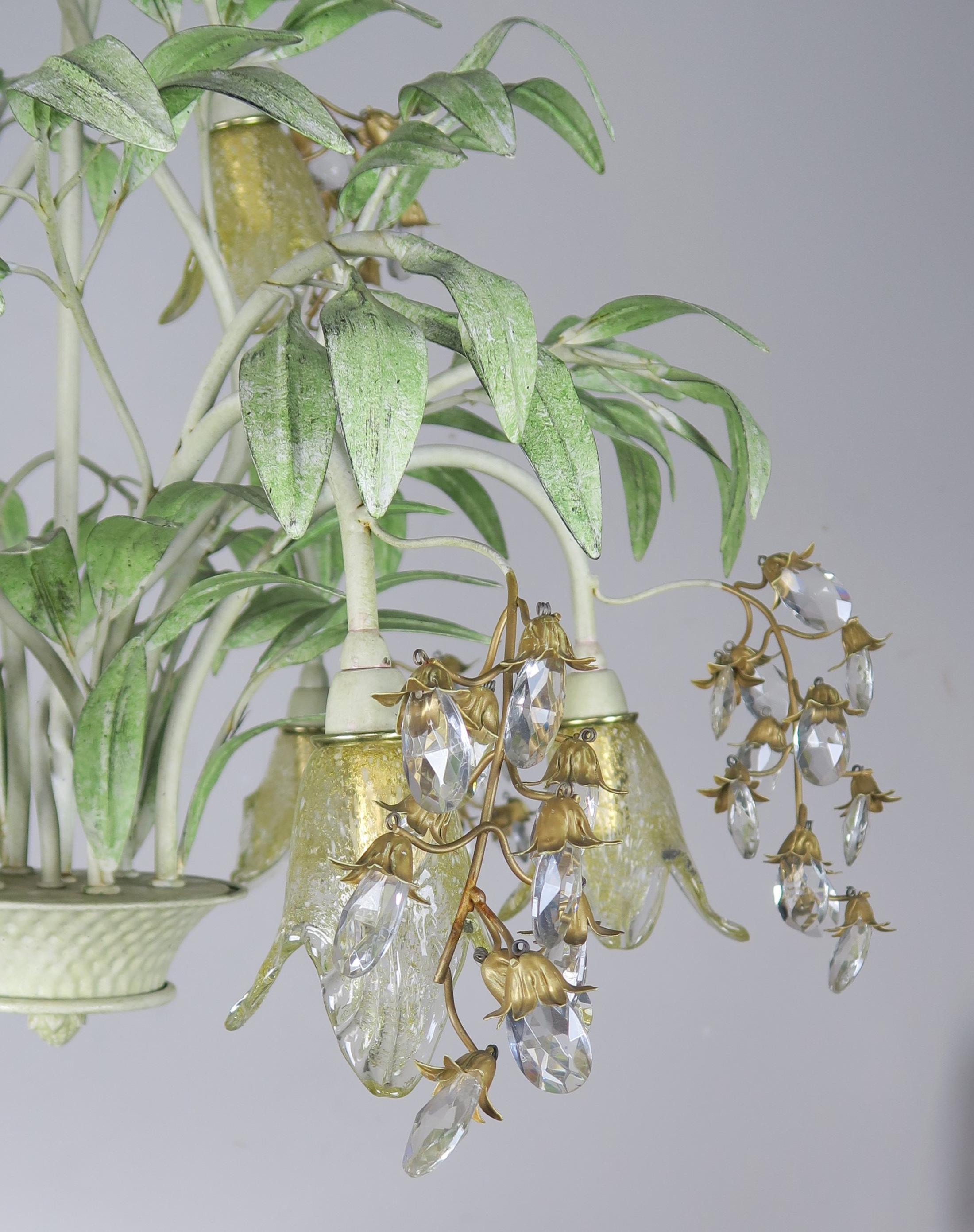 Unique Italian hand painted tole basket chandelier with hand blown Murano glass flowers and almond shaped crystals that add just enough sparkle to this whimsical piece. Eight-light fixture with eight hand blown tulip shaped golden colored flowers