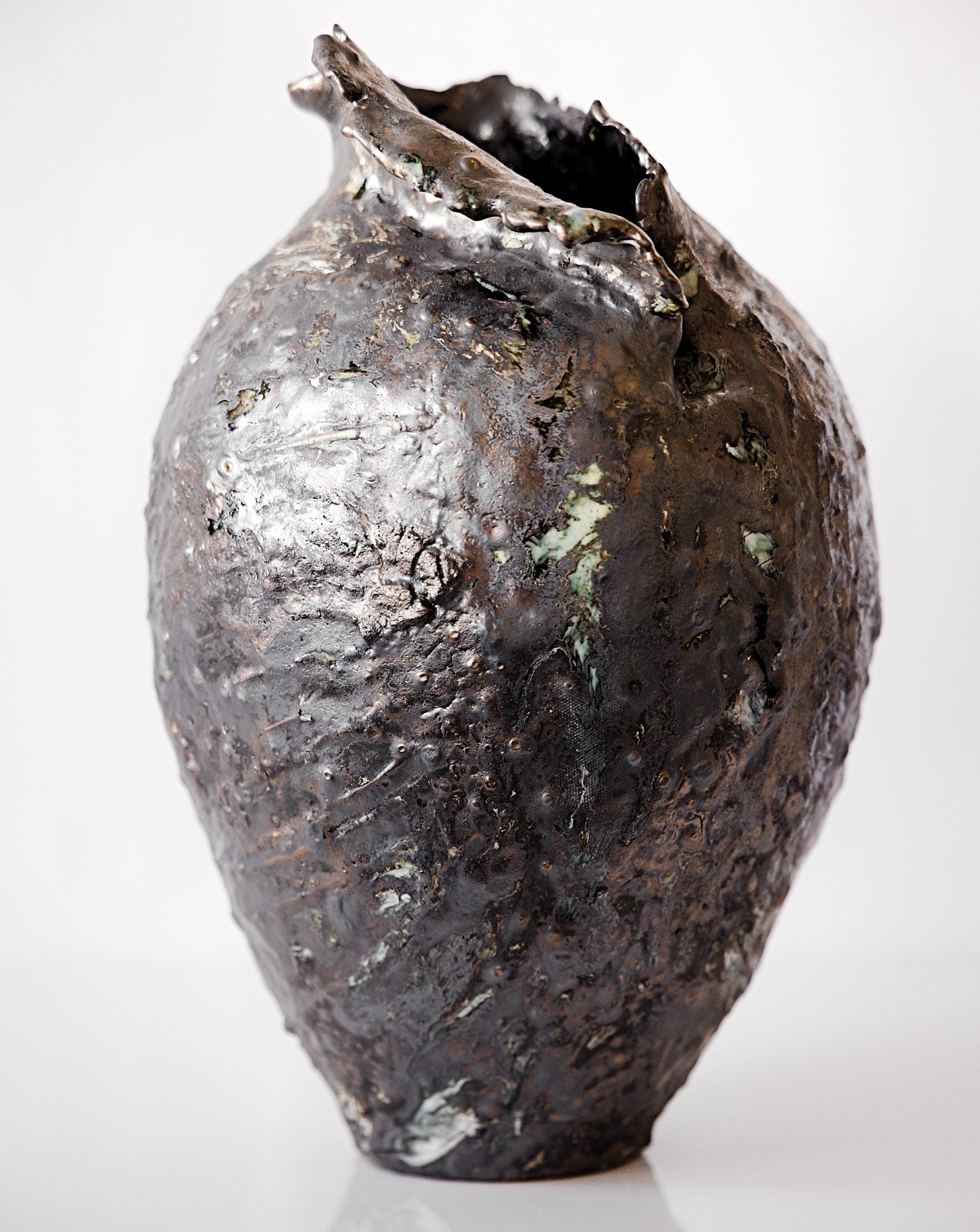 Discover the Painted 25 Series- Vessel V, where the exploration of handprinted Oxides and custom glazes 