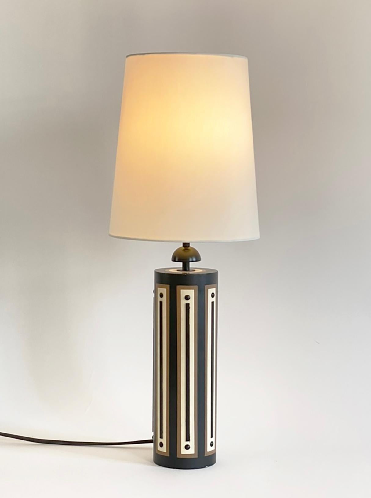 This is a striking handmade lamp by Matt Murphy Studio inspired by Tommi Parzinger. (See info below about Matt Murphy Studio and the Parzinger connection.) The base of the lamp is a solid cylinder of turned birch wood. The base is then hand-painted