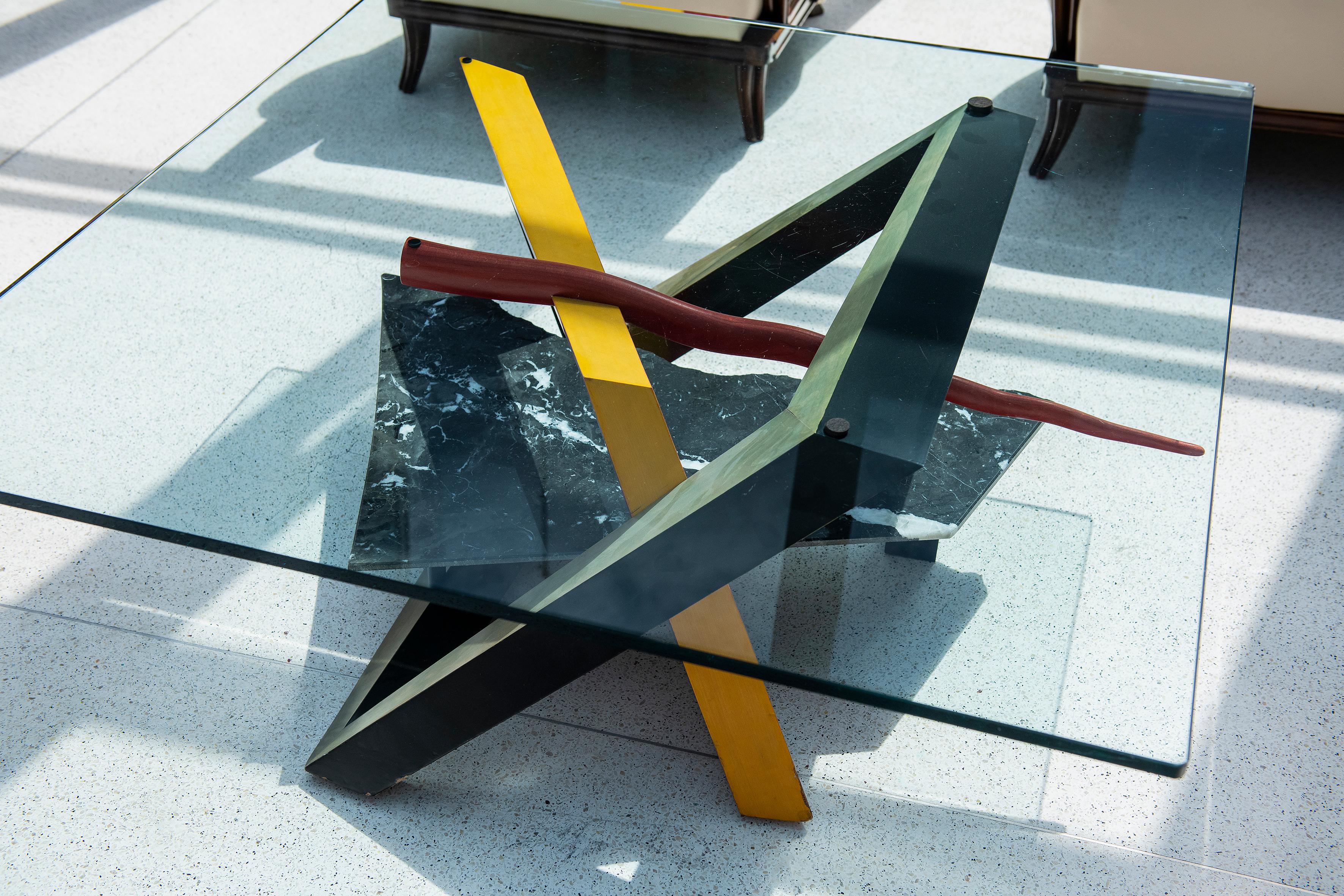 Painted wood, marble and glass low table. Italy, circa 1980.

Dimensions of the table structure without glass: 43 cm height, 100 cm width, 85 cm depth.