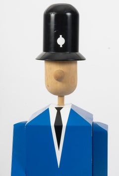 Painted wood sculpture of a Bobby with movable feet, arms and head, 20th century