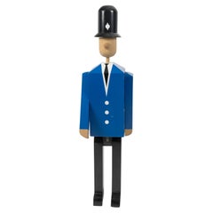 Painted wood sculpture of a Bobby with movable feet, arms and head, 20th century