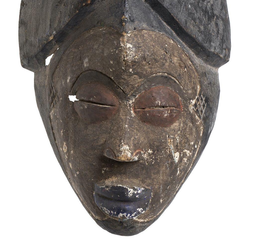Painted wooden mask is a contemporary African wooden art piece.

In good condition, except for minor signs of aging.
Provenance: Italian private collection.

Remembering that each African mask has a ritual meaning and a magician power, enrich