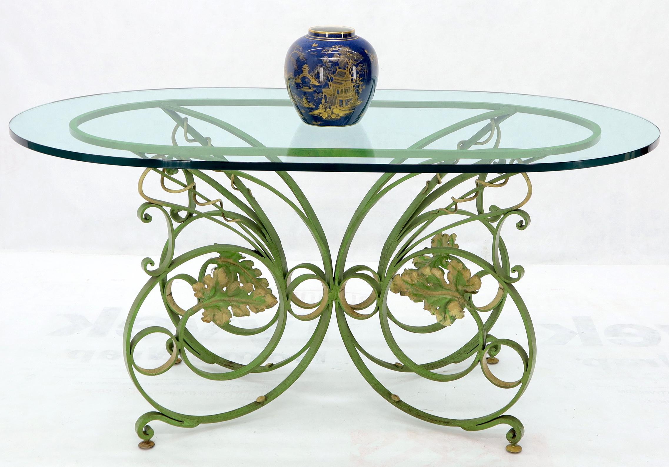 Painted Wrought Iron Base Oval Racetrack Shape Glass Top Dining Outdoor Table In Excellent Condition In Rockaway, NJ