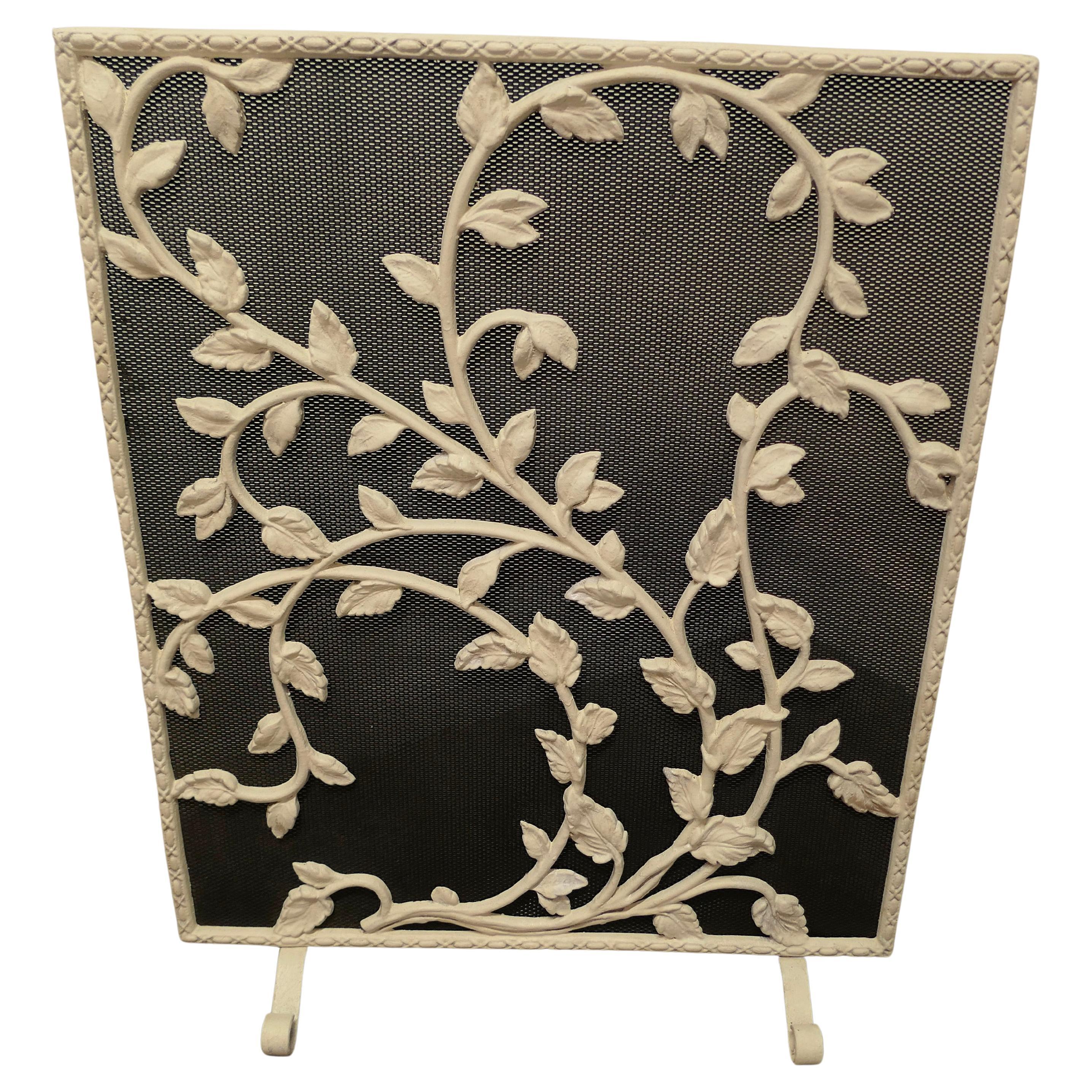 Painted Wrought Iron Fire Guard Decorated with Leaves For Sale