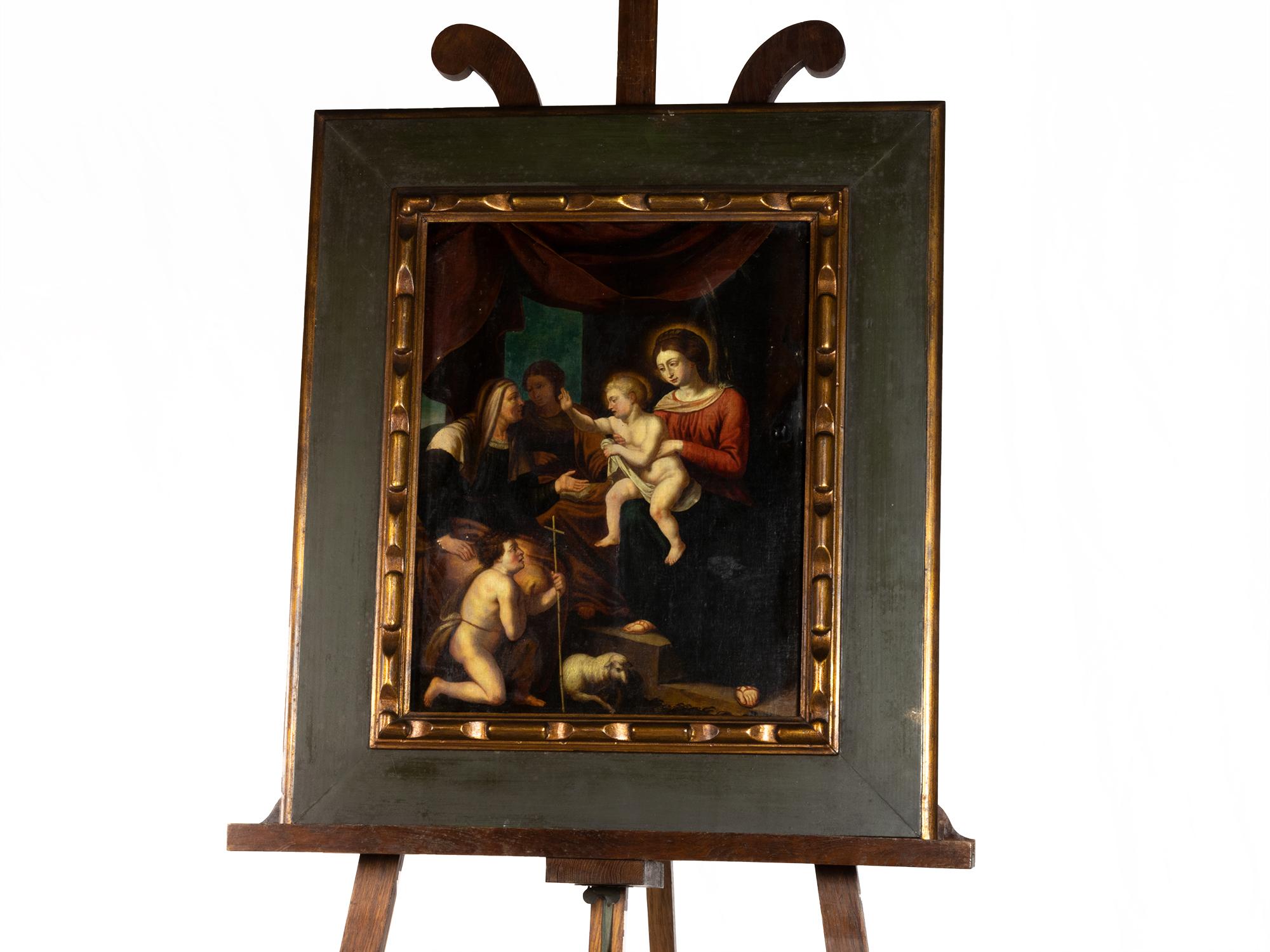 A Flemish School painting of the Adoration of the Child Jesus in the hands of Mary and a young Saint John the Baptist at his feet kneeling with the cross side by side with a resting lamb of God. 

Frame 63 x 73 cm 
Without frame: 41 x 55 cm

Matthew
