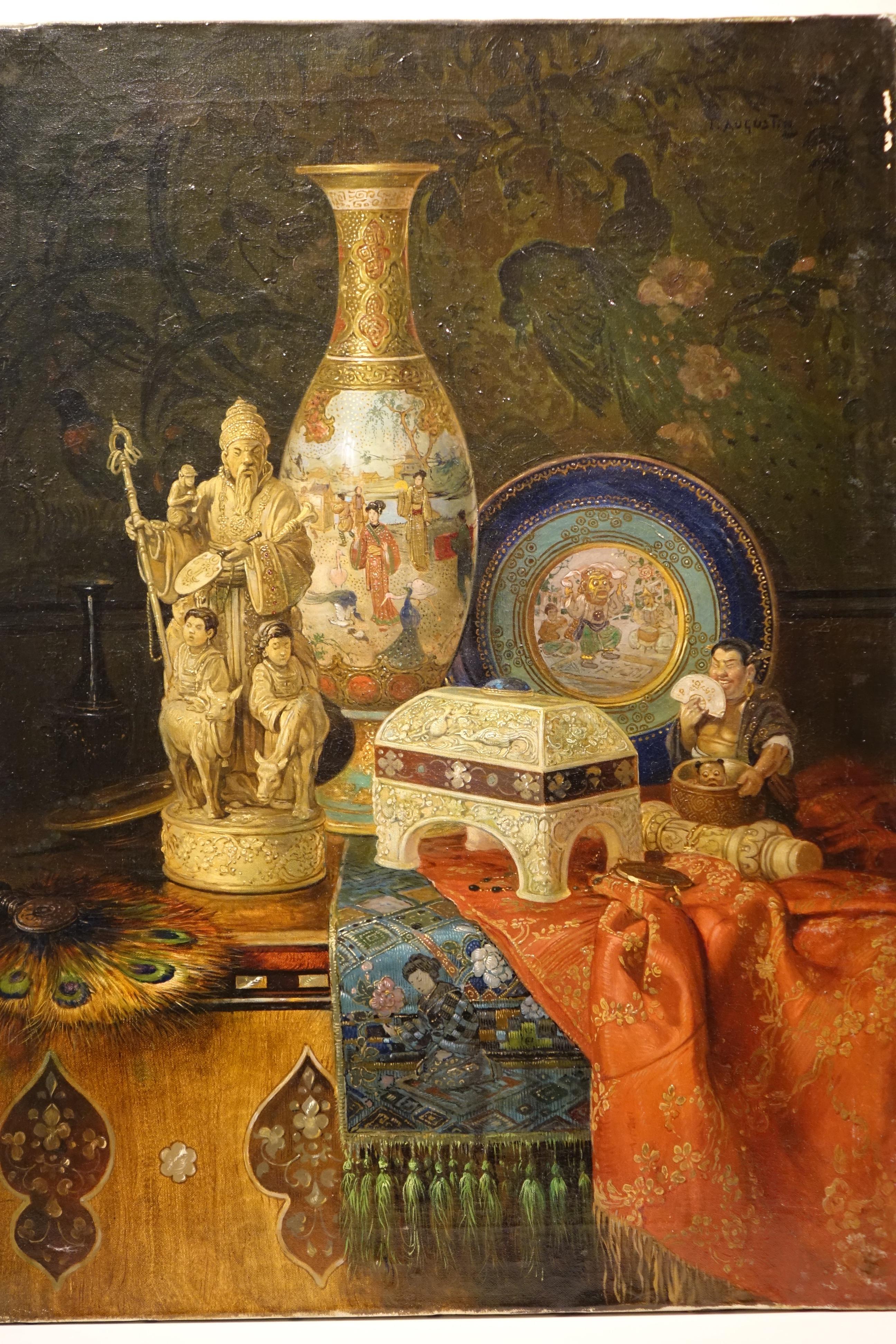 A painting, oil on canvas representing a still life on an inlayed entablature of mother-of-pearl, with several Chinese and Japanese objects (statuettes, box, porcelain, fabrics) painted with great care; a fan with peacock feathers, all in the front