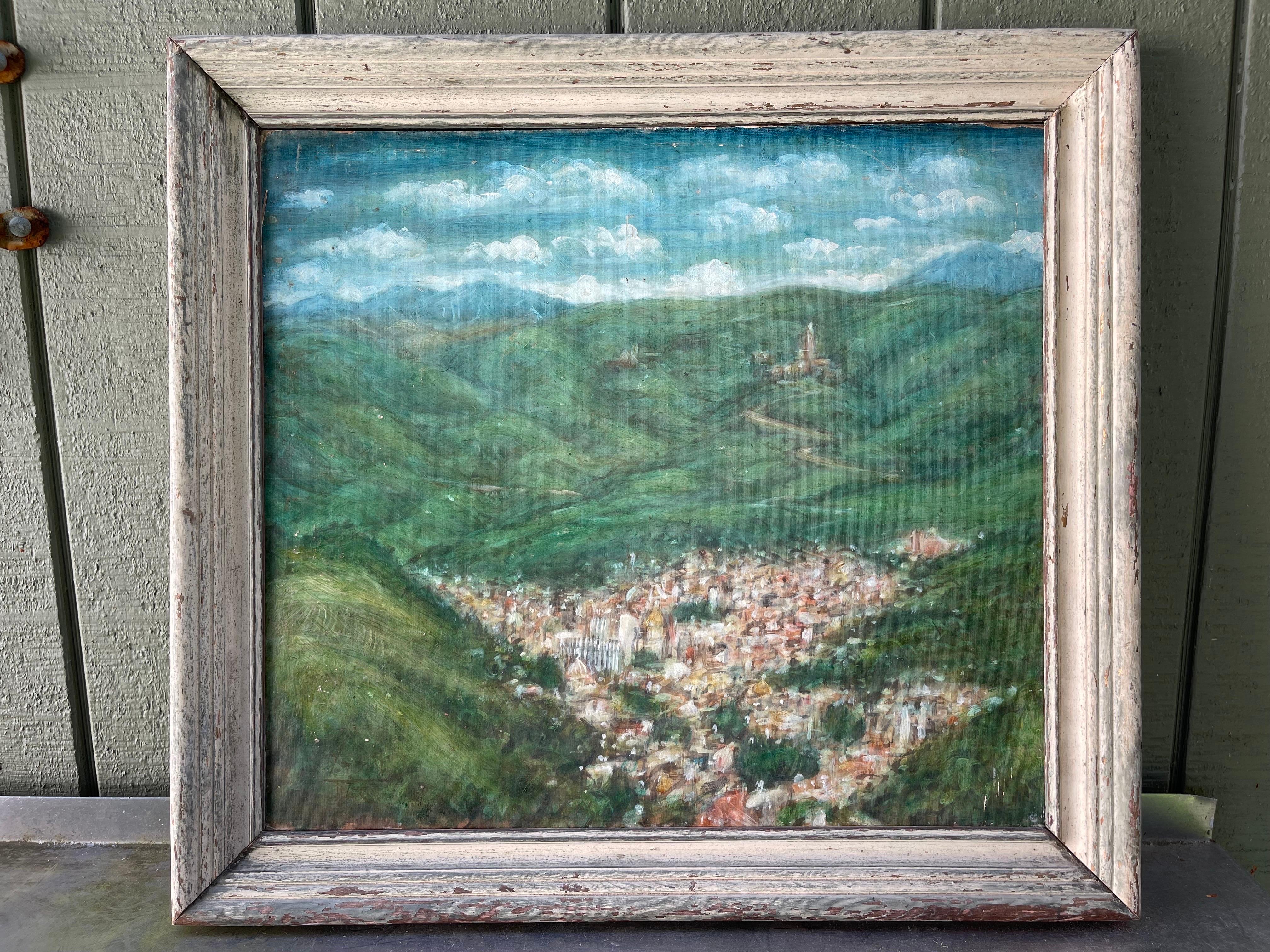 Pintura de un pueblo en las montañas. Óleo sobre tabla. Sin enmarcar y sin firmar.