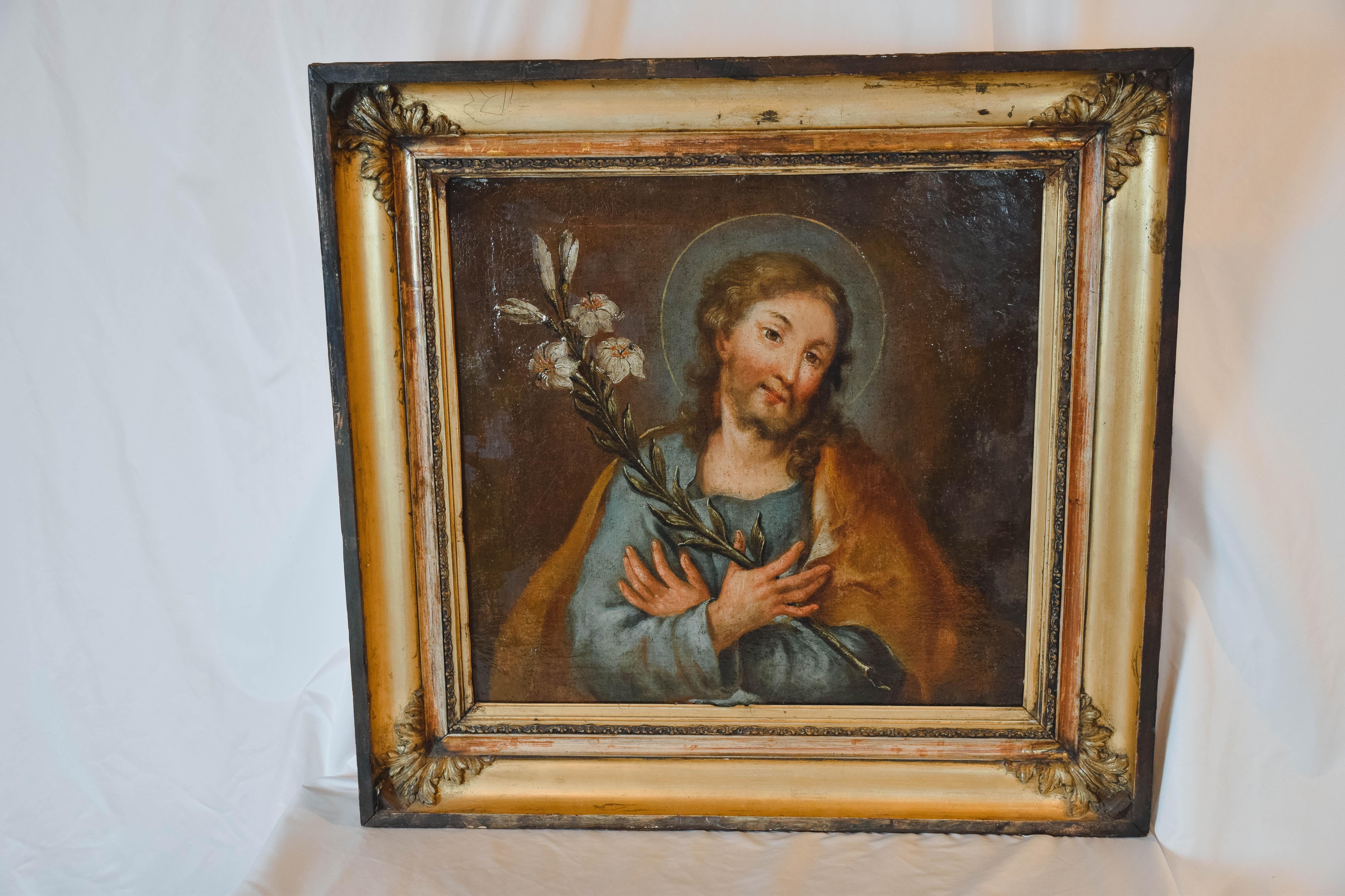 This beautiful oil on canvas painting of St. Joseph with his hands crossed over lilies was found in France. Although we could not find a signature, this piece was probably originally painted for the decoration of a church and has wonderful colors