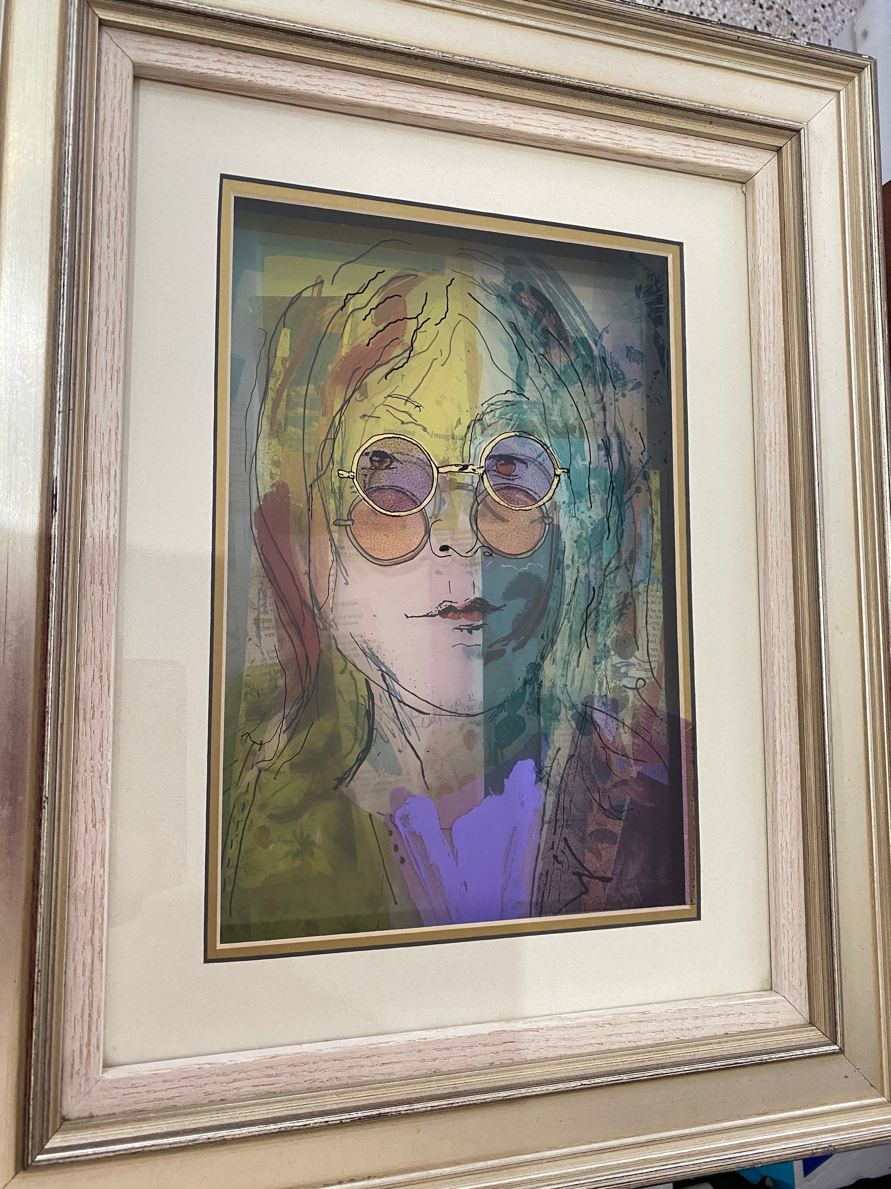 This three-dimensional painting on glass of the singer John Lennon was created by Jean Pierre Weill.

Note: Signed AP Edition 31 of 35

Note: Overall dimensions are 20.75