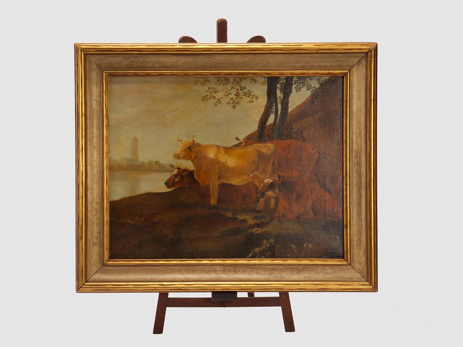 An Oil on canvas painting depicting a group of cows grazing wildly in a rural landscape. Giltwood frame. Austria circa 1880. 