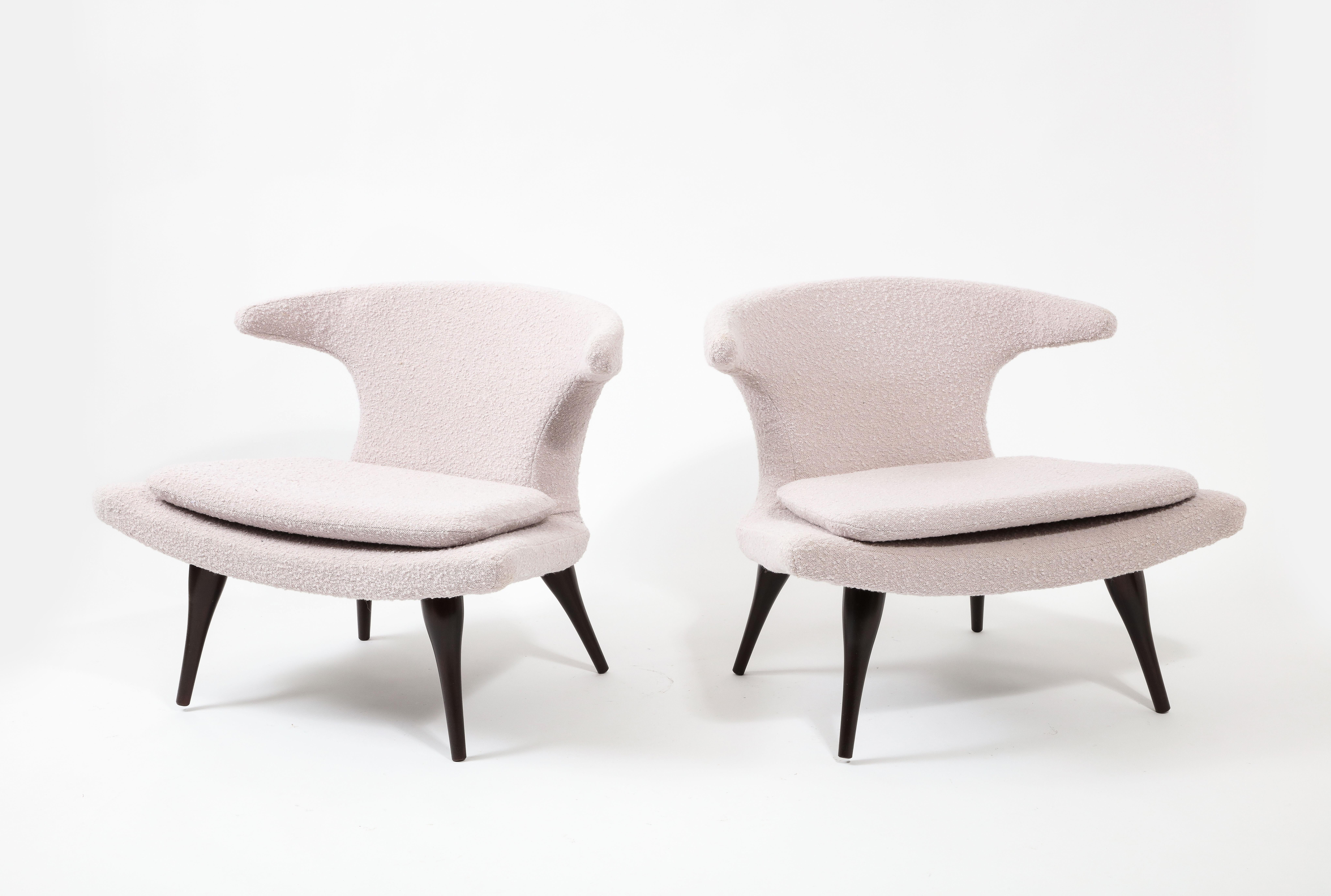 Pair of Horn chairs by Karpen of California in pink bouclé on walnut legs.
