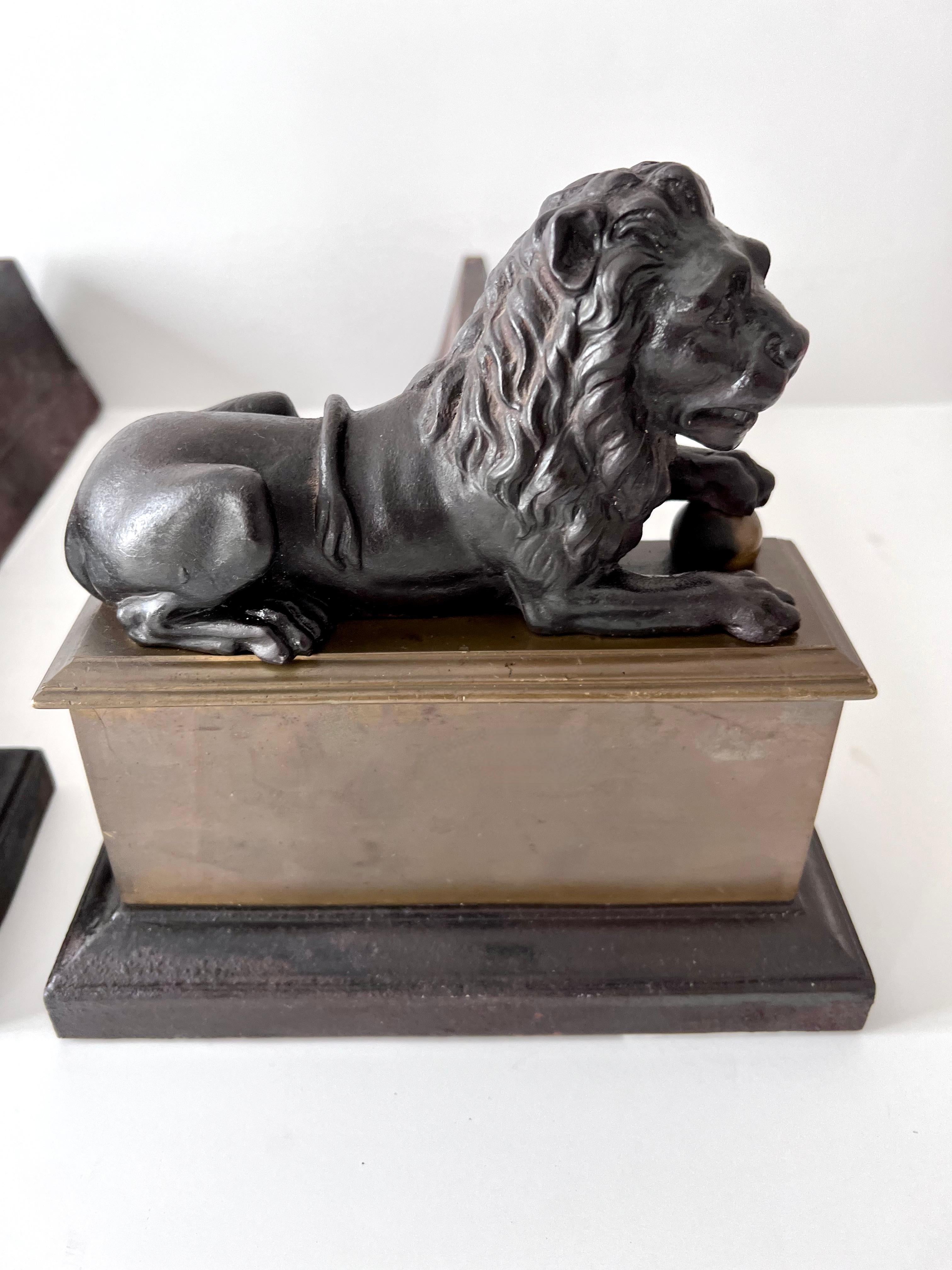 Pair 18th Century Reclining Iron Lion Andirons on a Brass Base For Sale 1