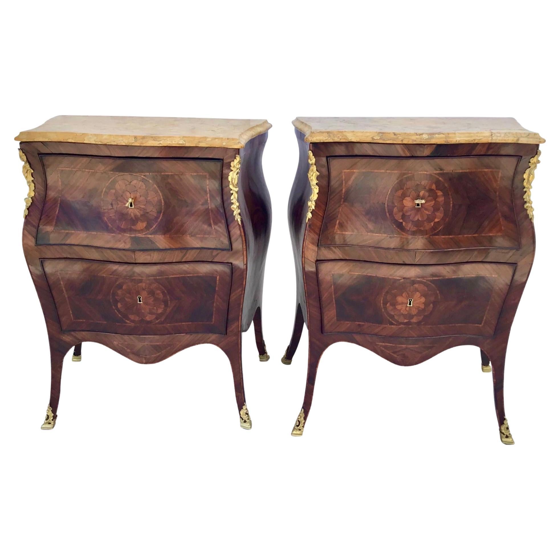 Pair of 18th century Italian Rococo gilt bronze-mounted walnut and fruitwood inlaid bedside Comodini commodes bedside chest of drawers / side tables. Very elegant work, with original Sienna marble tops. Neapolitan 
This rare pair would serve as