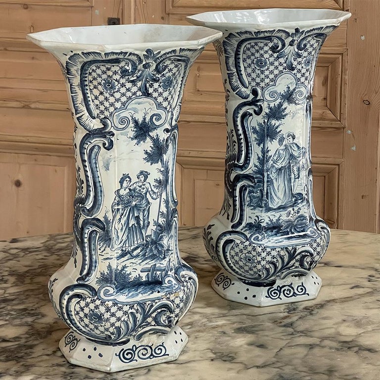 Pair 18th century delft blue & white vases are of a type that is getting more rare with each passing year. Alas, the fragile nature of such hand-crafted ceramics means a certain percentage is lost each year to breakage, but that makes the remaining