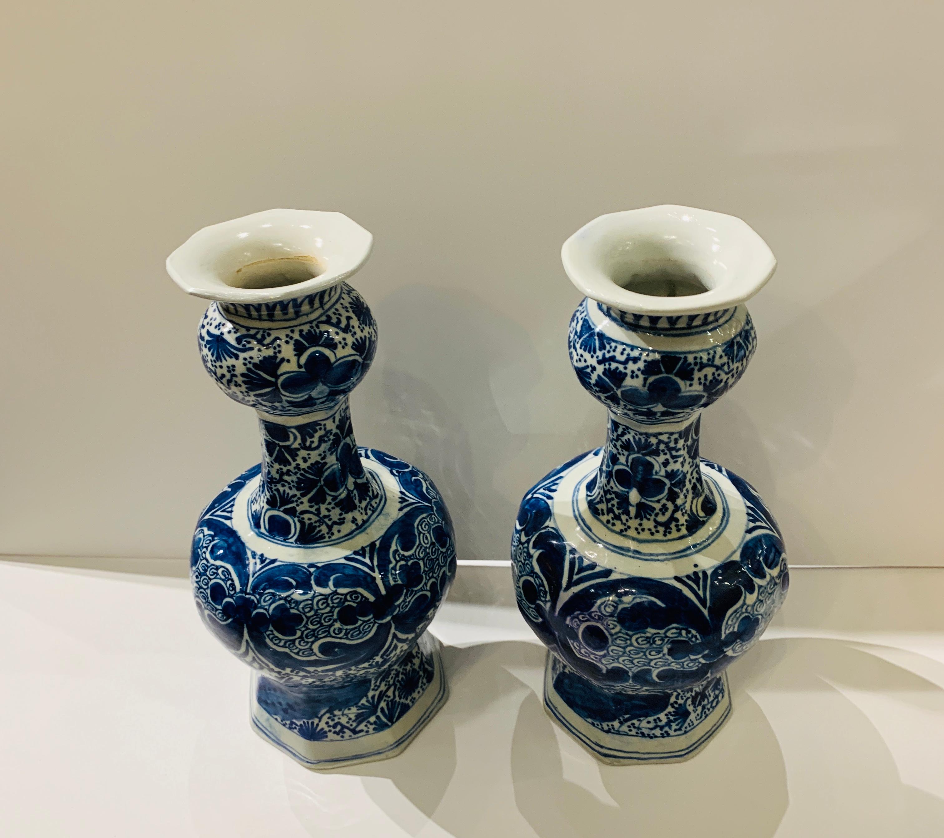 A Pair of Dutch Delft Blue and White Vases made in the 18th century circa 1780. 
The vases measure 11.25